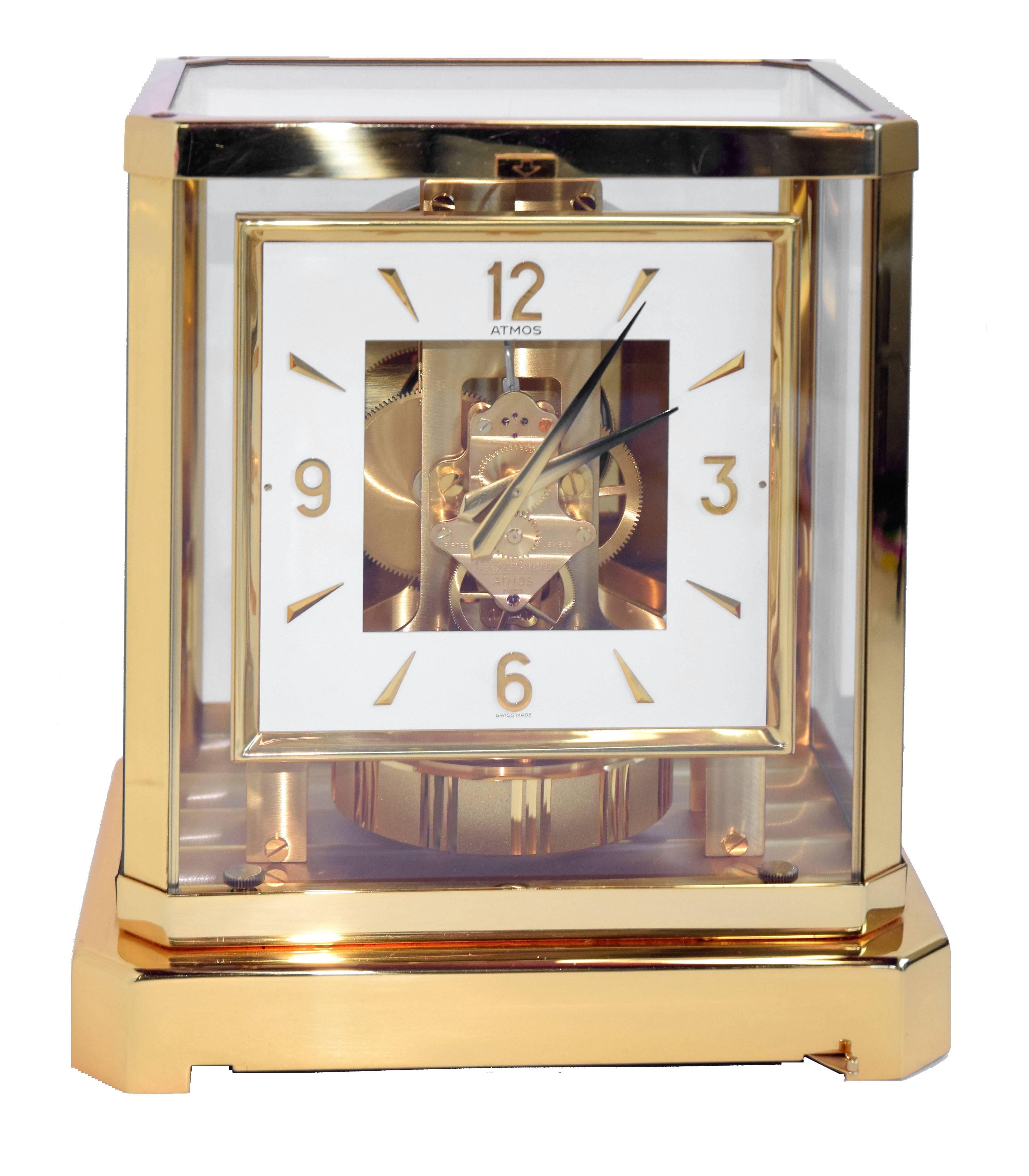 Jaeger-LeCoultre Atmos perpetual motion gold-plated 15 jewel clock. Model number 528-8, circa 1984. The clock is in perfect working order, white square dial is in excellent condition (more rare), has Arabic gold-plated over brass numerals going
