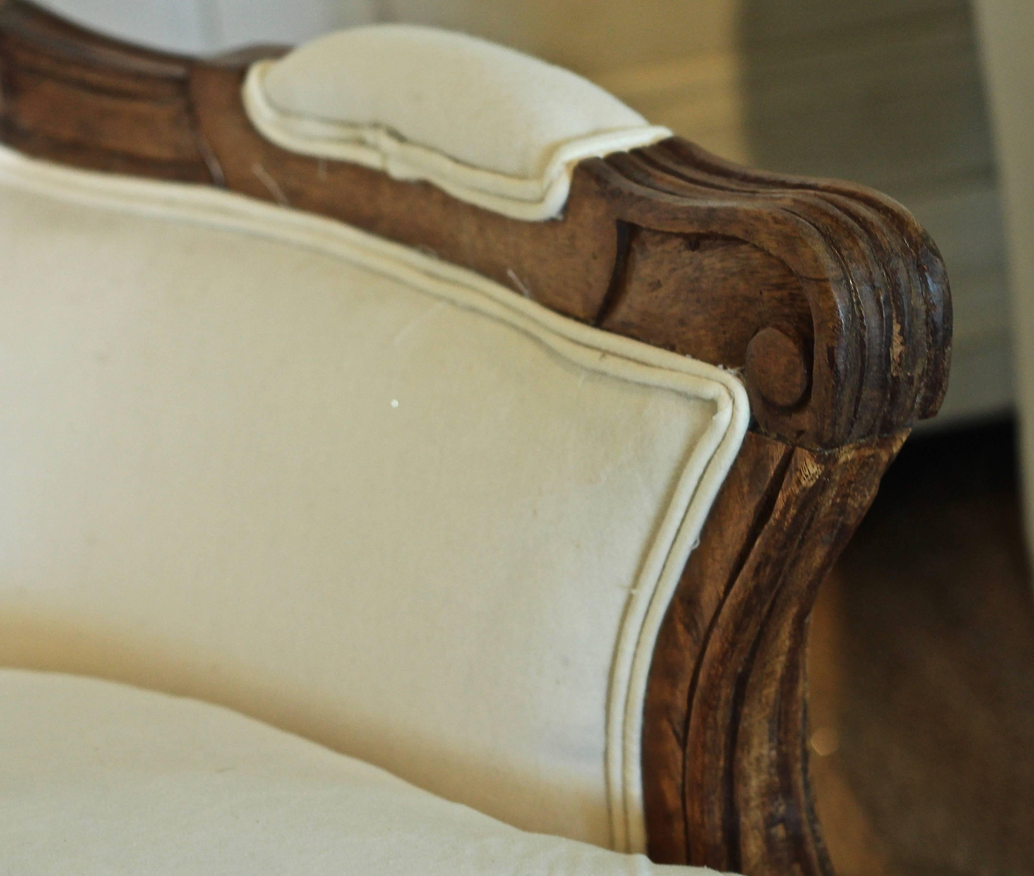 Pair of lovely French armchairs with fruitwood frame. Freshly covered in muslin.