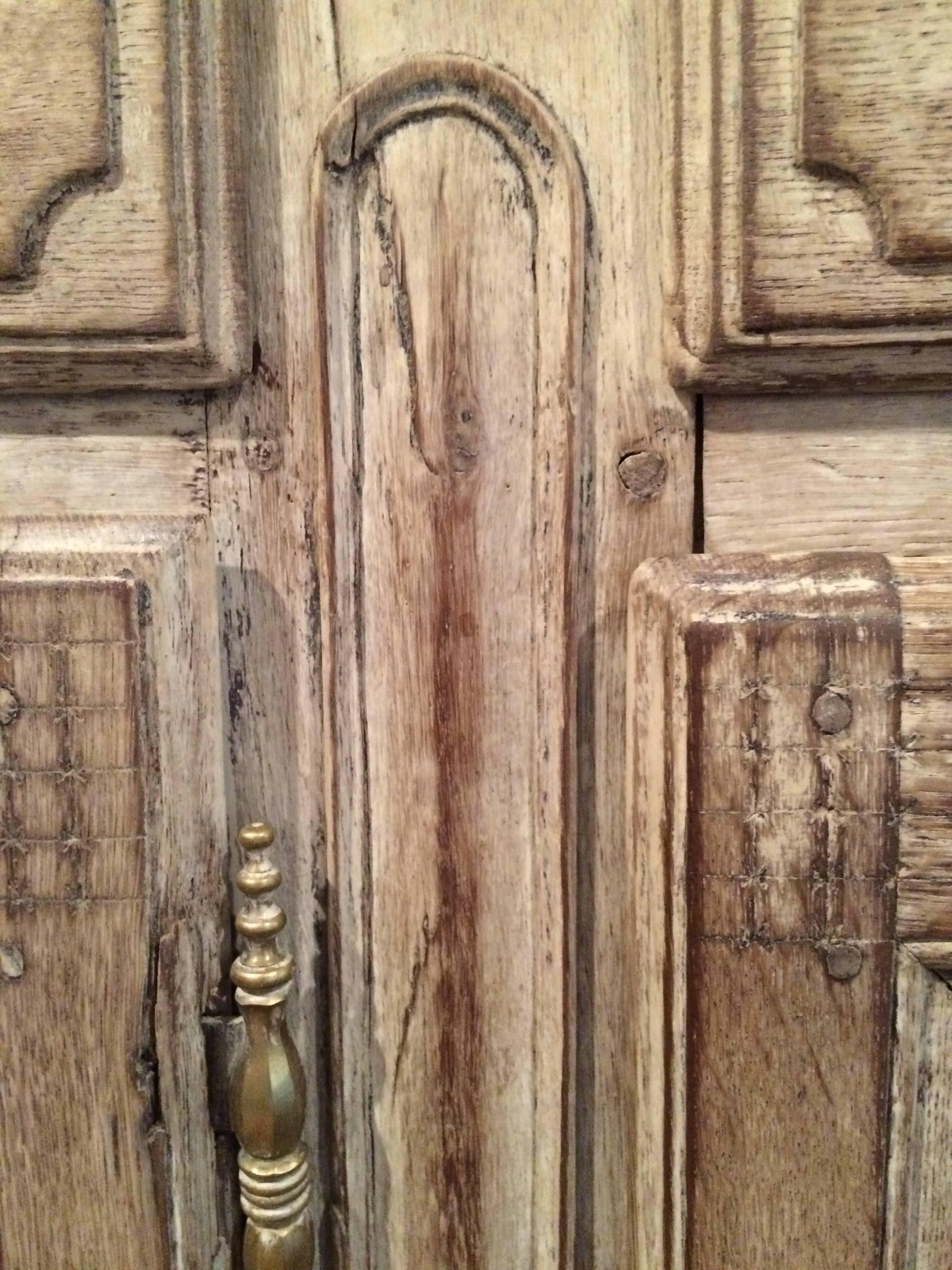 19th century weathered oak enfilade with pair of chicken wire covered doors.