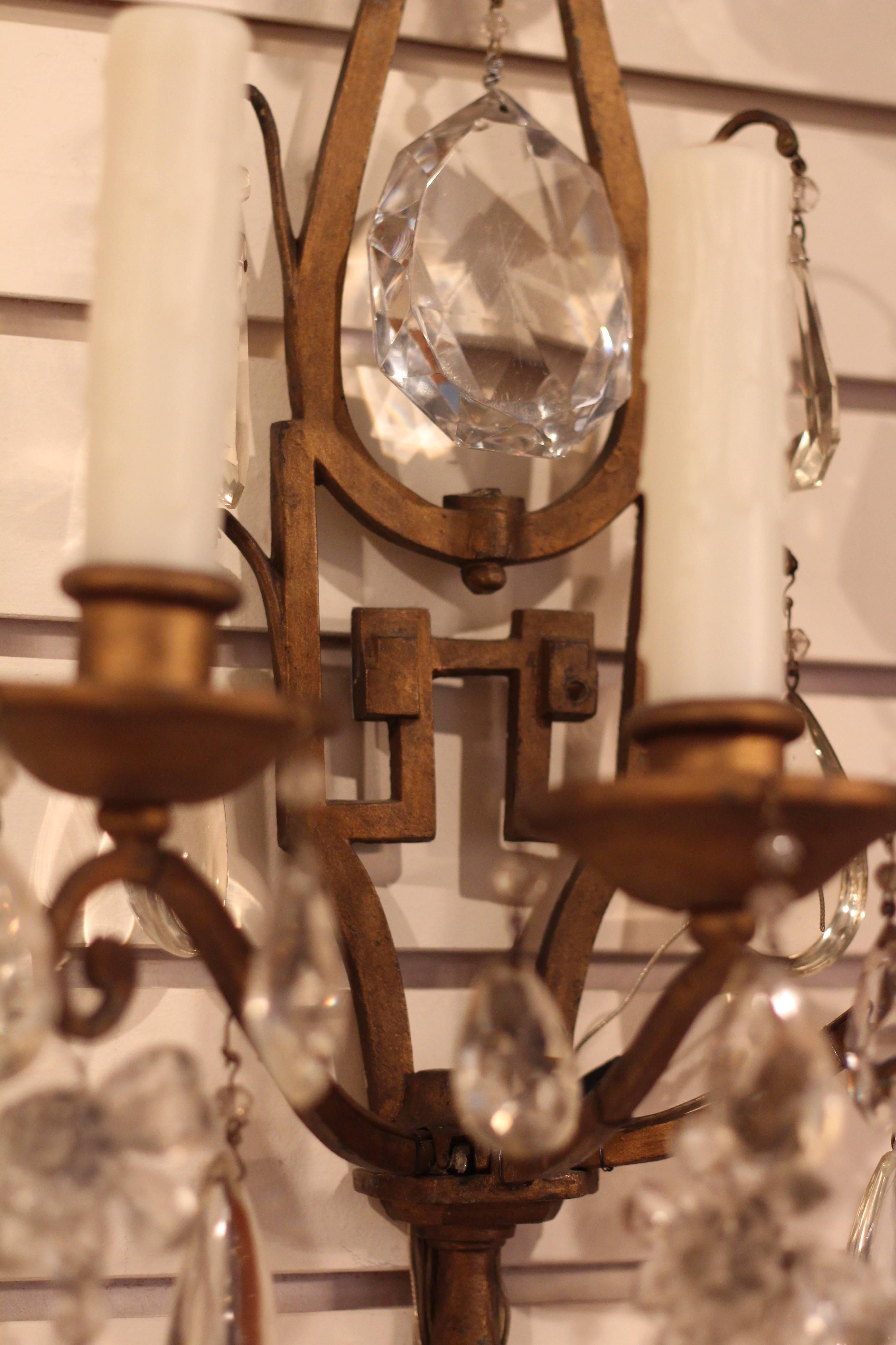 Pair of Bagues crystal sconces each with three lights. Two pairs available.