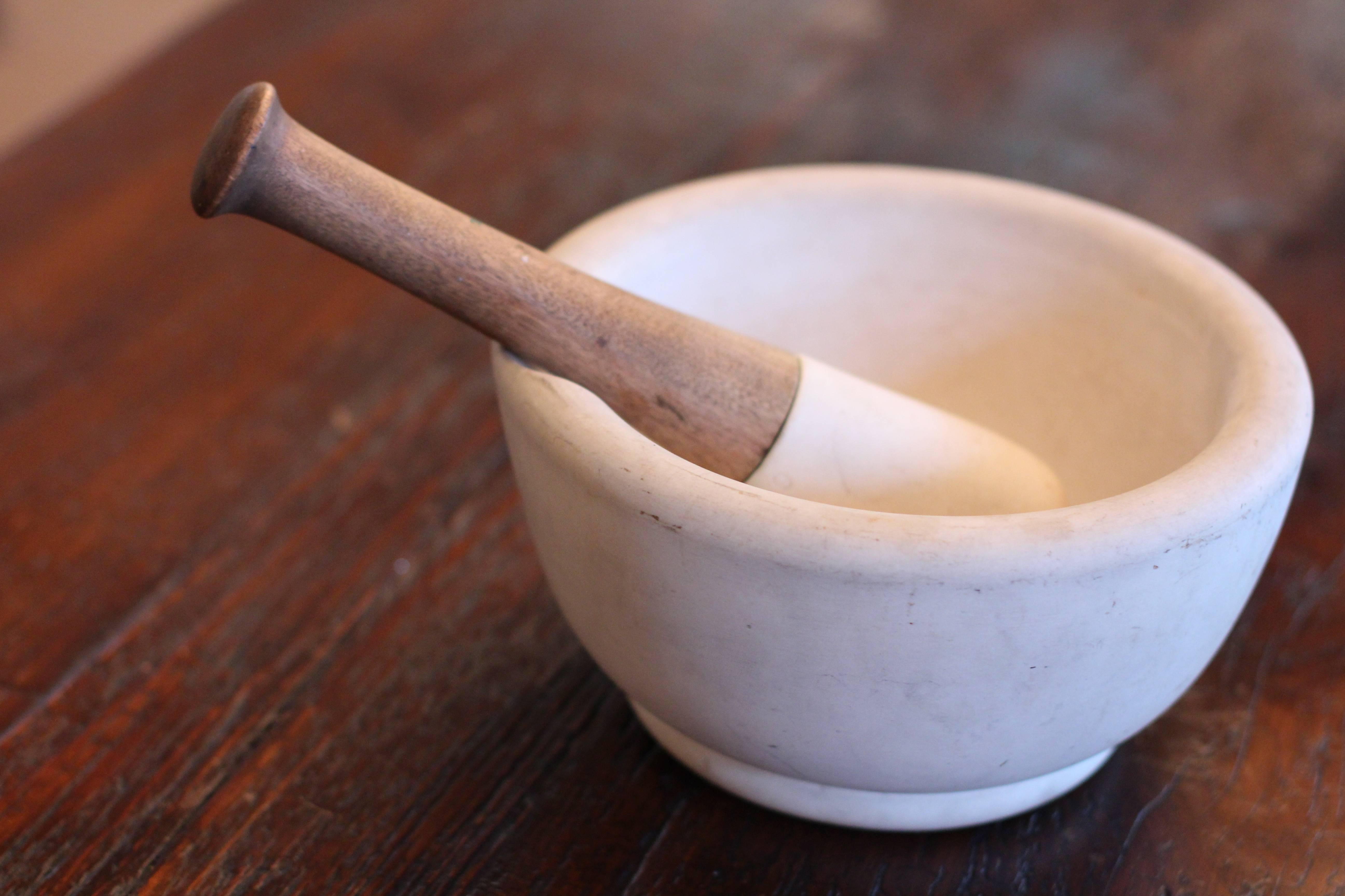 Marble mortar and pestle.