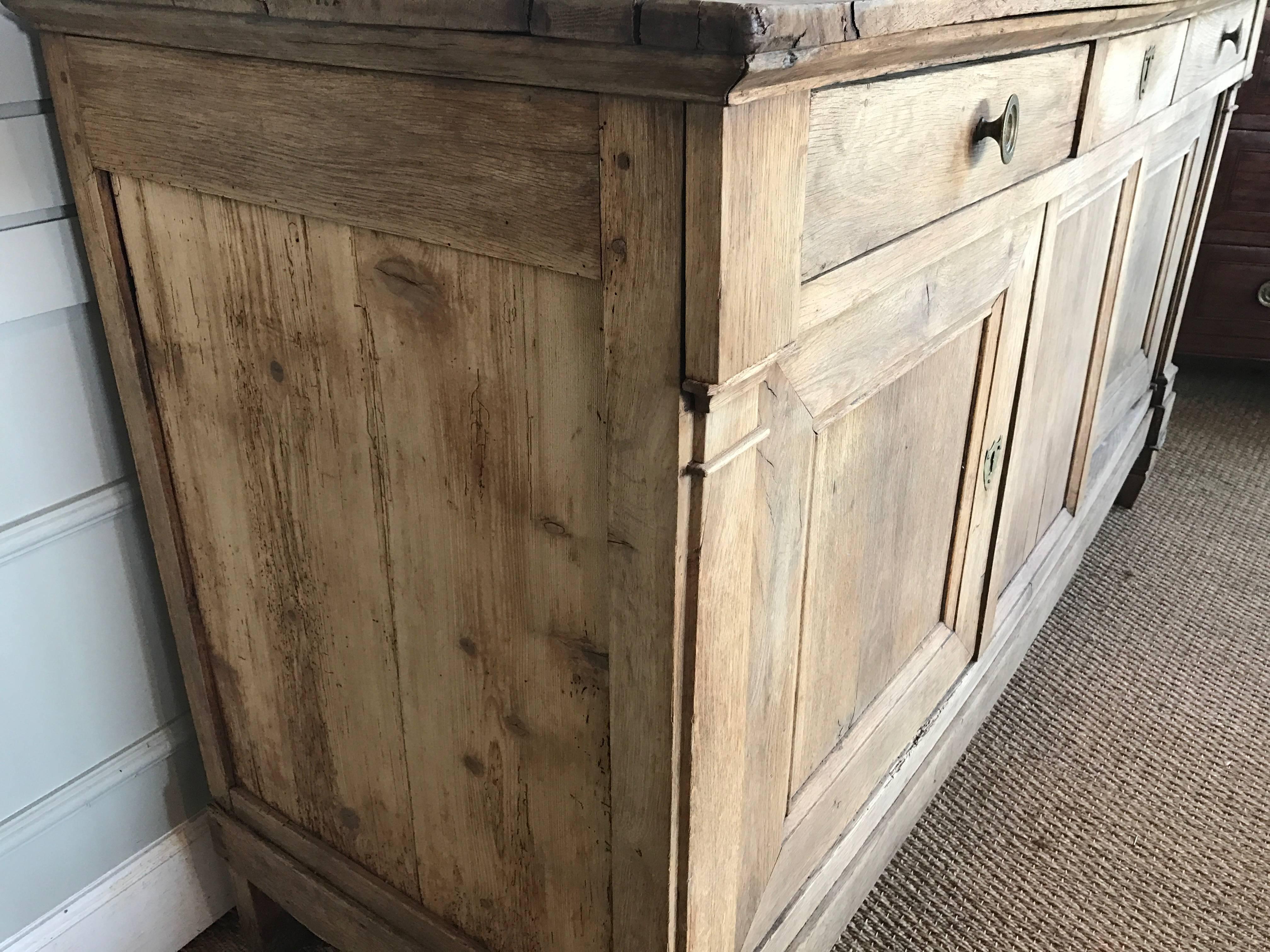 19th century French enfilade made of oak. Two doors with hidden catch on one.