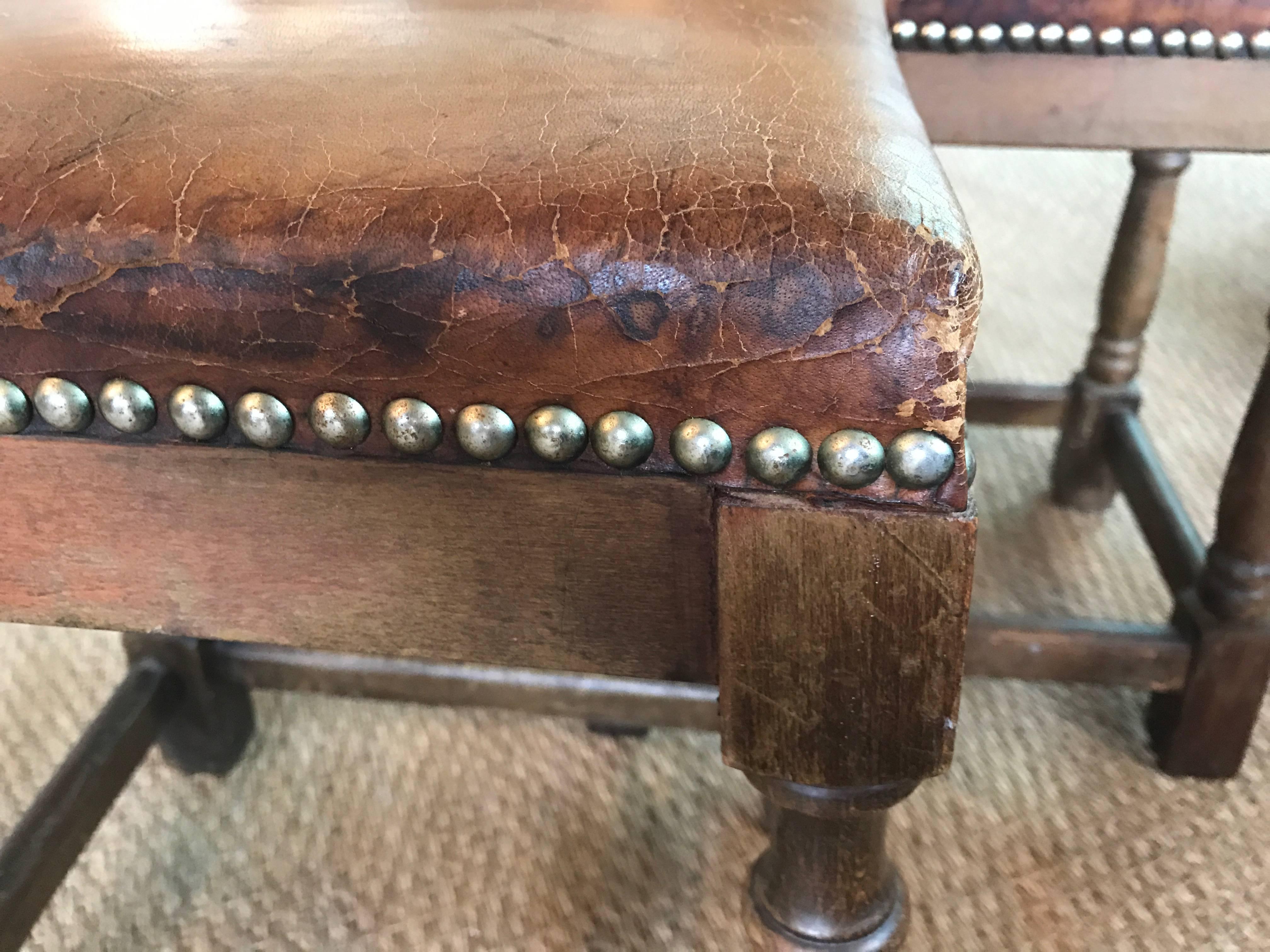 Pair of English leather top low stools.