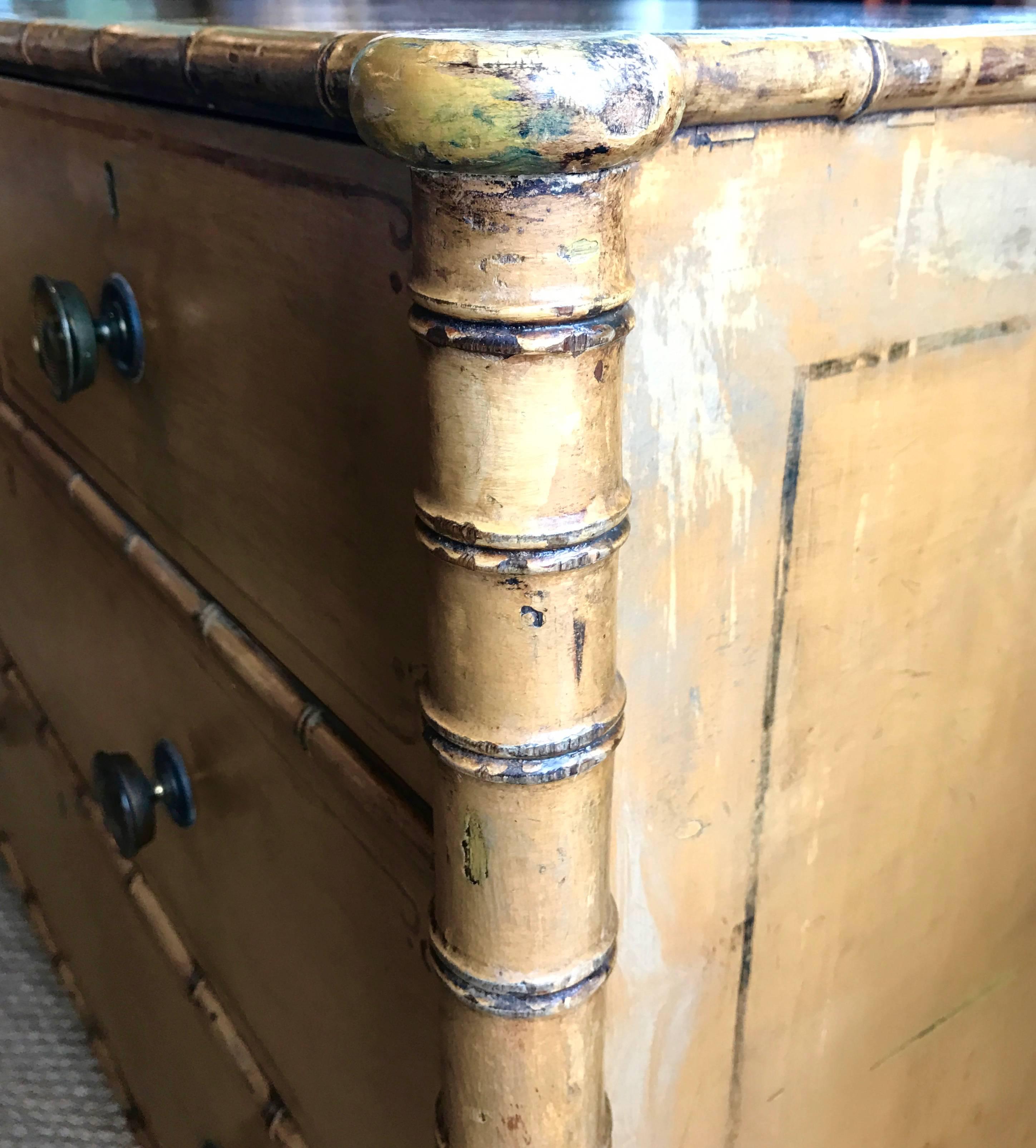 19th century Regency style faux bamboo painted chest with original hardware and makers mark.
