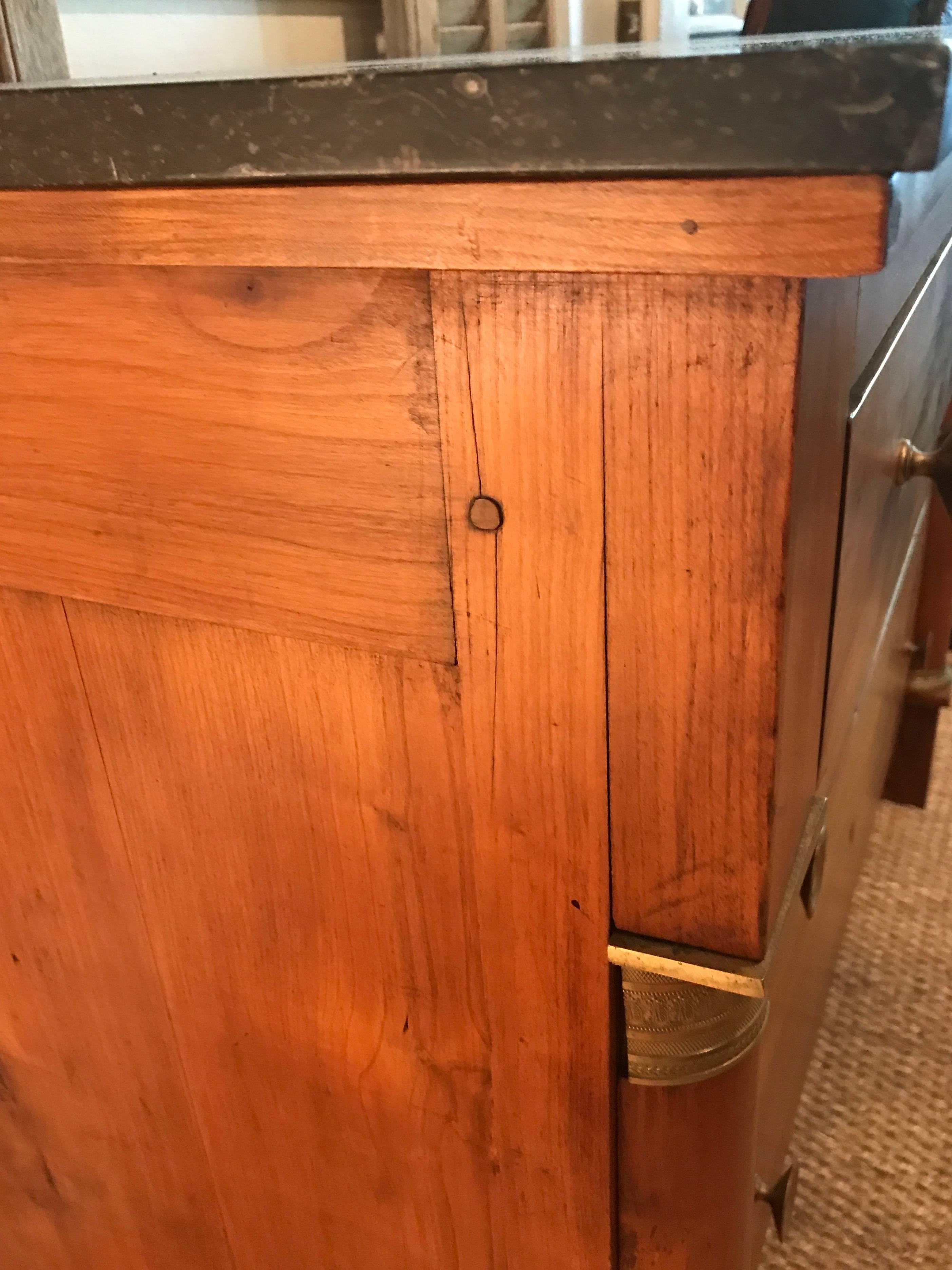 Empire period cherrywood commode.