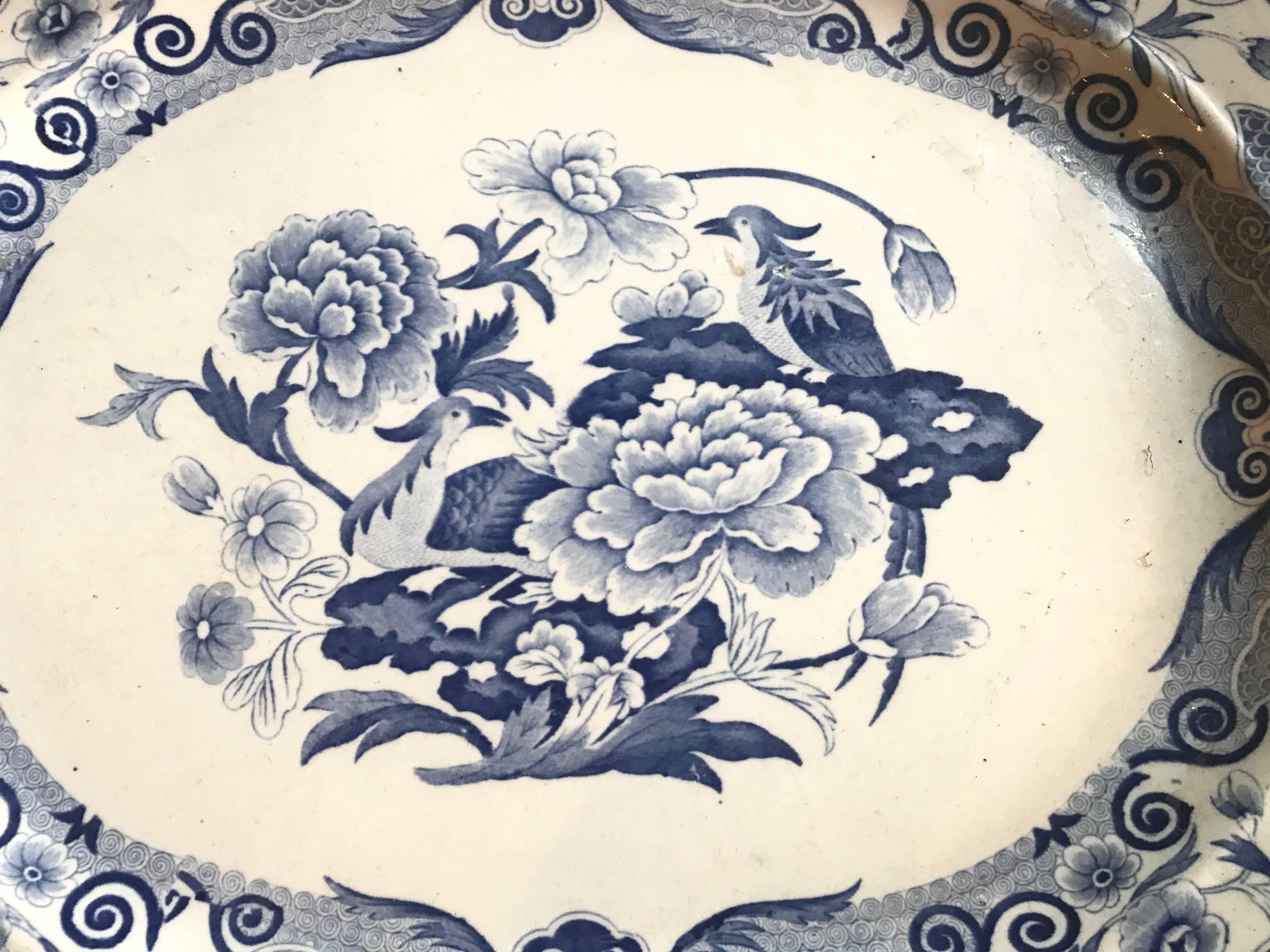 Blue and white transferware platter with impressive scale and beautiful decoration.