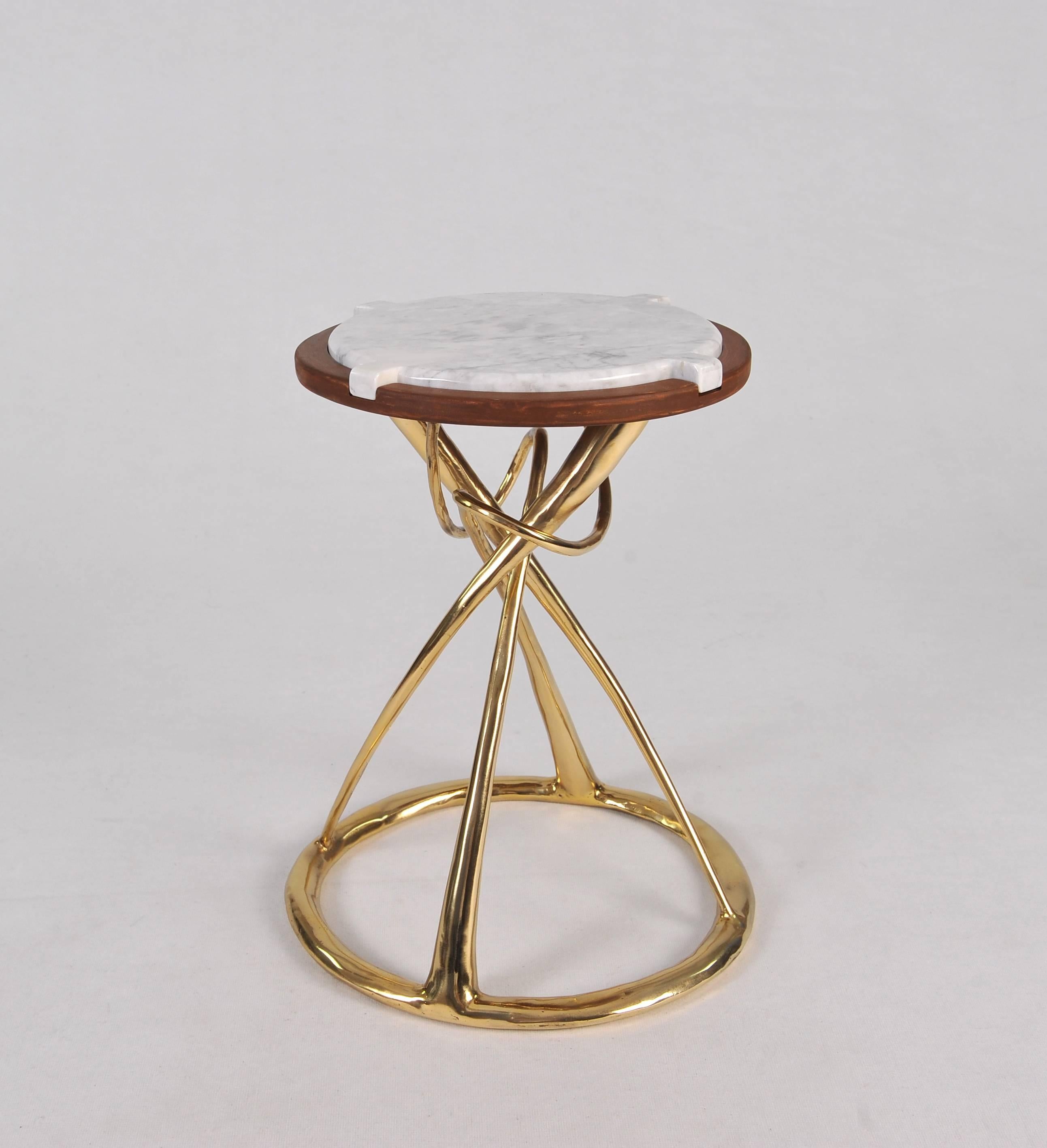 Pair of brass side tables, hourglass by Misaya
Dimensions: H.49 x W.35 x L.35 cm
Handsculpted brass and marble tables.