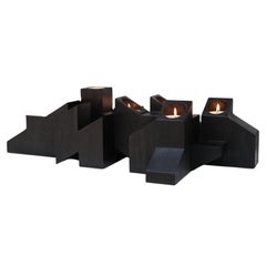 Tiered Structure Black Skyline Candle Light in Iroko Wood by Arno Declercq