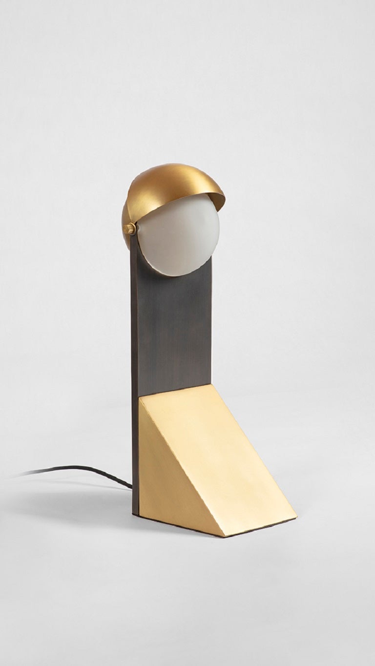 Brass Dance of Geometry Table Lamp by Square in Circle
Dimensions: H 48 x W 14 x D 18 cm.
Materials: brushed brass, brushe grey metal.

Inspired by costumes from The Bauhaus Ballet, this triadic table lamp design utilizes the three essential