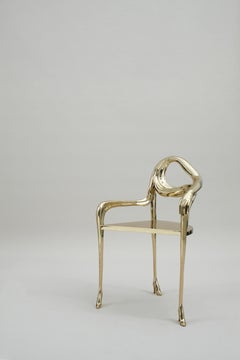 Sillón Leda de Salvador Dalí, latón pulido, diseño moderno, España