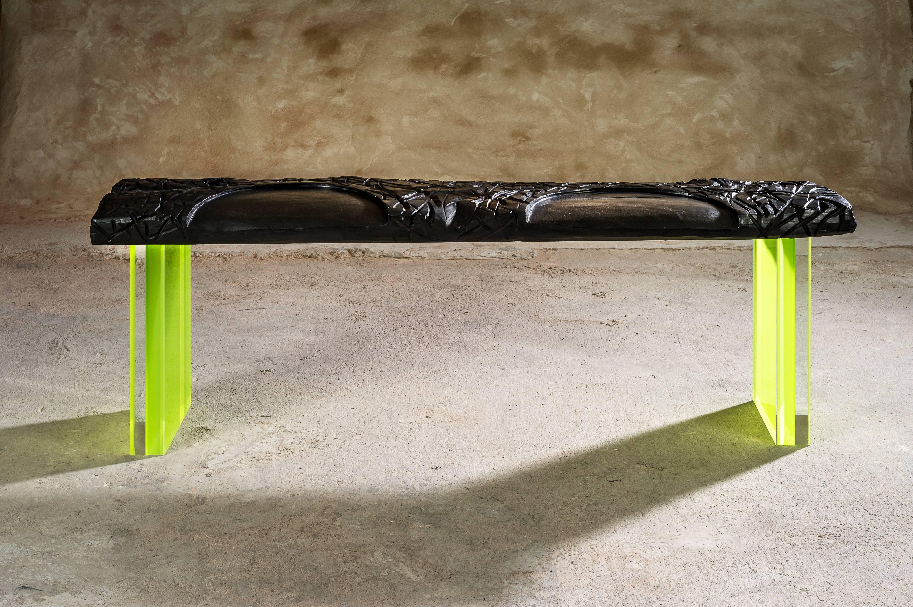 Calciné is part of Charly Bounan's new collection.
It is a unique hand-sculpted bench by Charly Bounan.

Edition: 
Unique and signed.

Dimensions: 
53 x 148 x 29 cm.

Materials: 
Sculpted wood with graphite wax.
Moulded plexiglass with