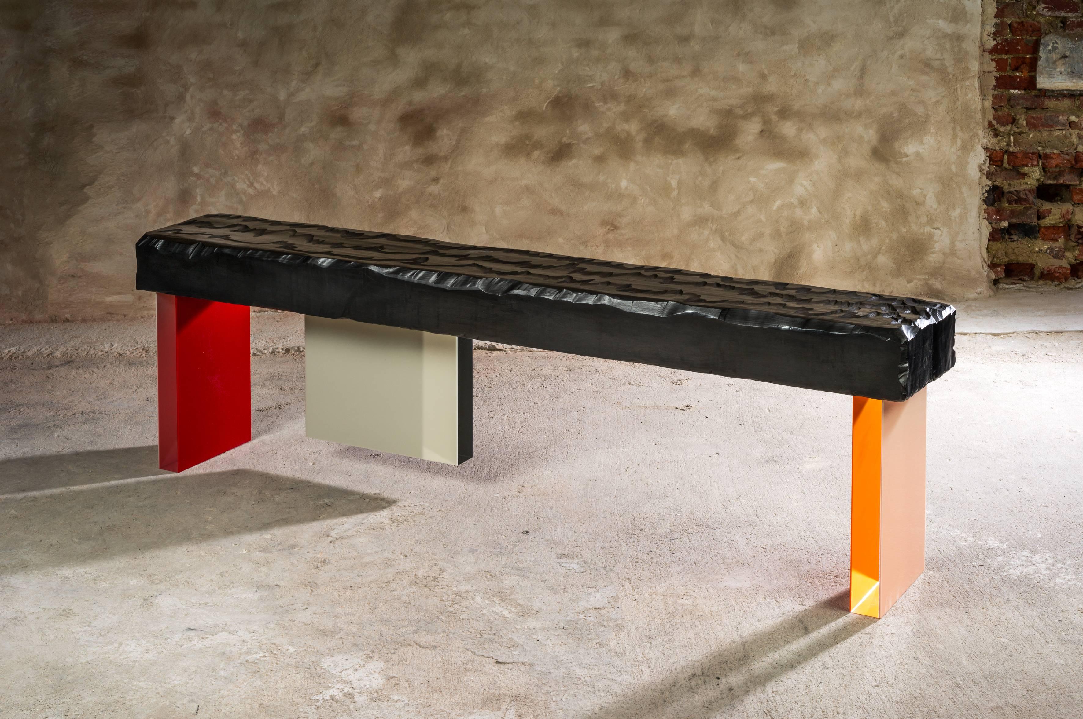 The Colorful Calciné bench is part of Charly Bounan's New Collection.
It is a unique hand sculpted bench by Charly Bounan.

Edition: 
Unique and signed.

Dimensions: 
59 x 200 x 30 cm 

Materials: 
Sculpted Wood with Graphite Wax
Moulded