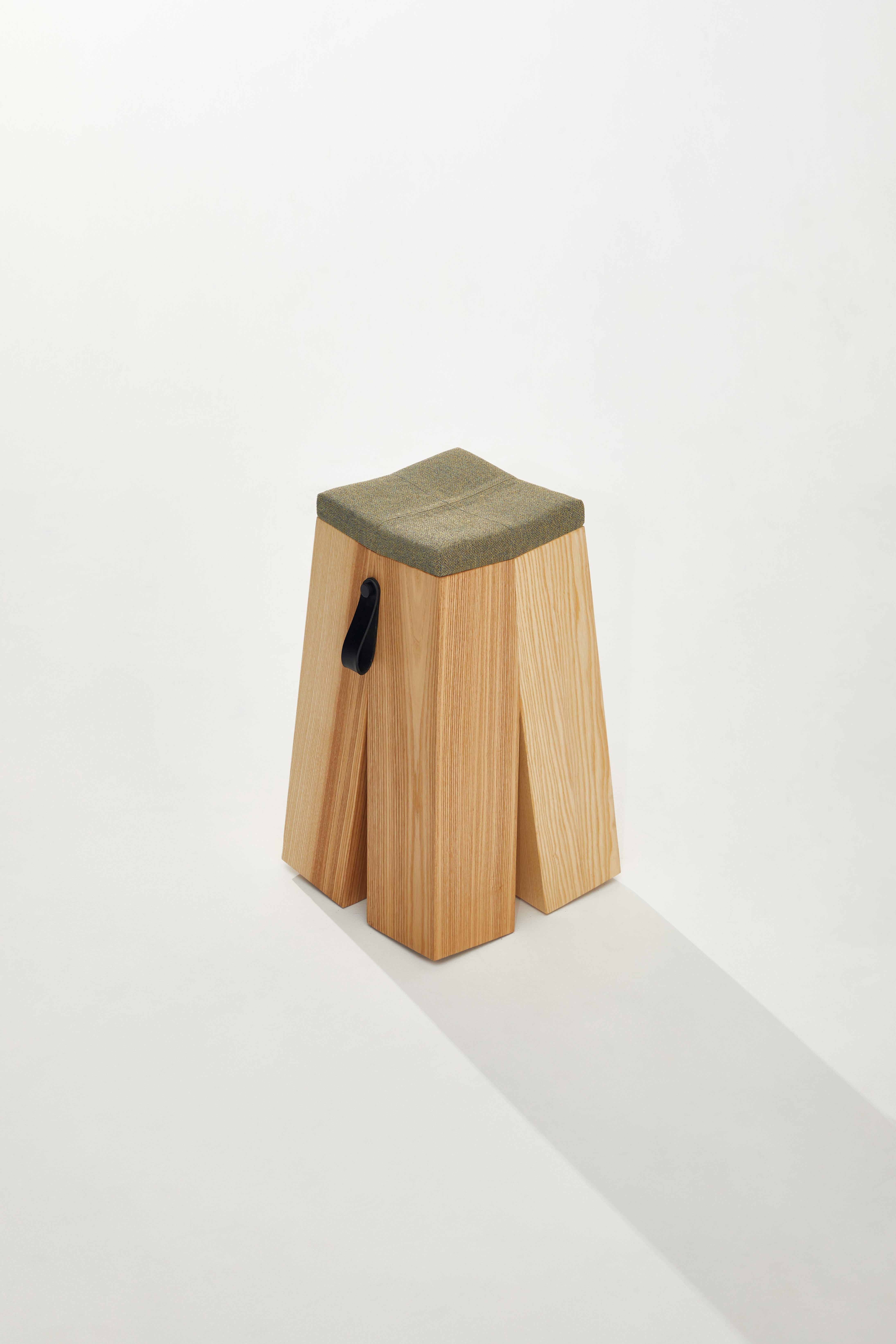 Happens Stool in Ash Wood And Melange Wool Fabric by Heilig Objects
Dimensions: D 29 x W 29 x H 49 cm.
Materials: Ash wood and wool fabric.

Daniel Heilig. A young Hungarian-German designer, charismatic artist and creative cosmopolitan. Born in