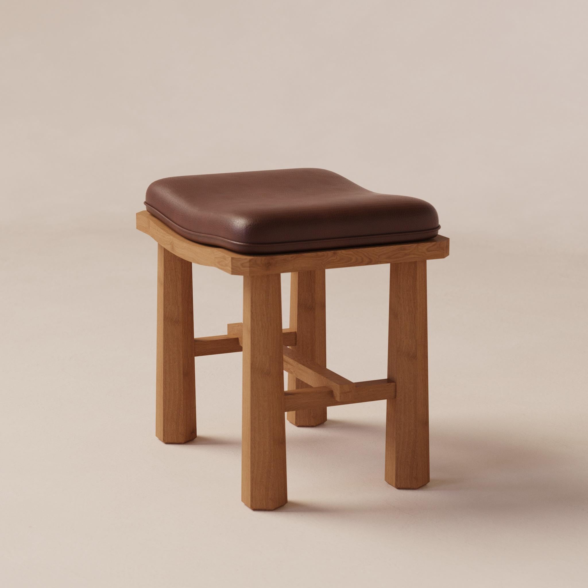 Temple Oak and Leather Stool by Luis Gimeno
Dimensions: D 35 x W 45 x H 45 cm
Materials: Oak, leather.

Made out of four hexagonal prisma legs, this stool is a throw back to classic and elegant handcrafted furniture.
The cushion if made of leather,