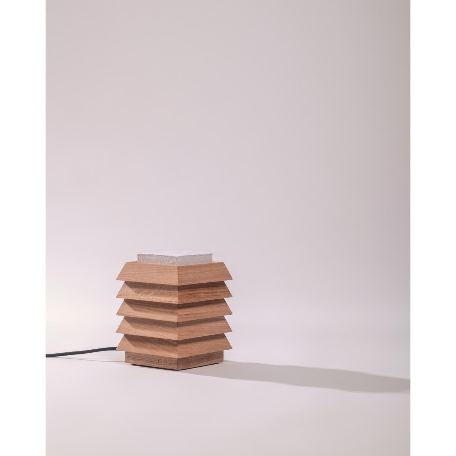 Pagode Small Table Lamp in Oak Wood & Natural Japanese Paper by Heilig Objects
Dimensions: D 15,3 x W 15,3 x H 22 cm.
Materials: Oak wood and natural Japanese paper.

All our lamps can be wired according to each country. If sold to the USA it will