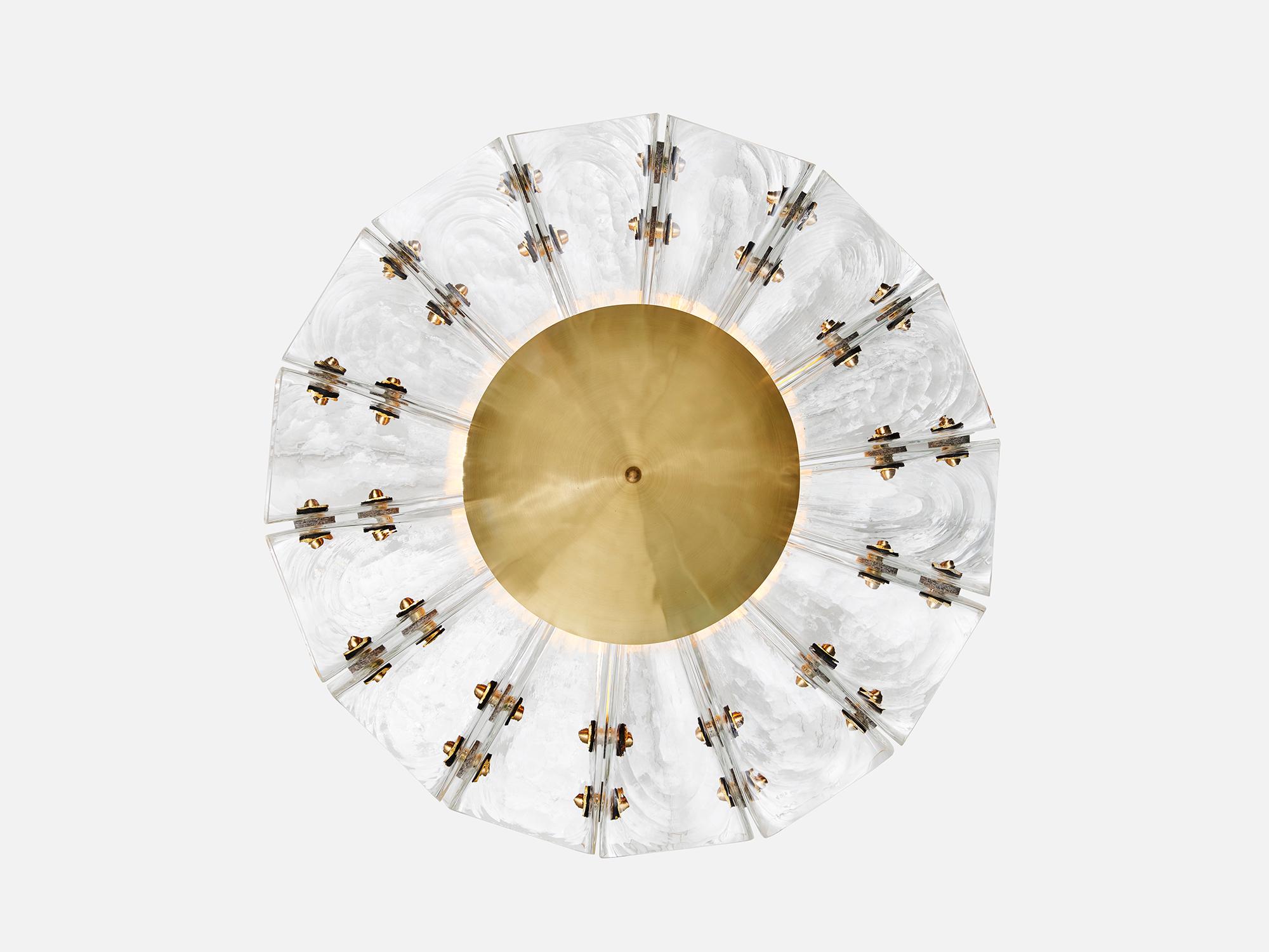 Polaris Flush Mount in Brass, Leather & Selenite Glass by Bianco Light + Space
Dimensions: Ø 61 x H 20 cm.
Materials: Brass, leather, and glass.

Available in different finish options. Prices may vary. All our lamps can be wired according to each