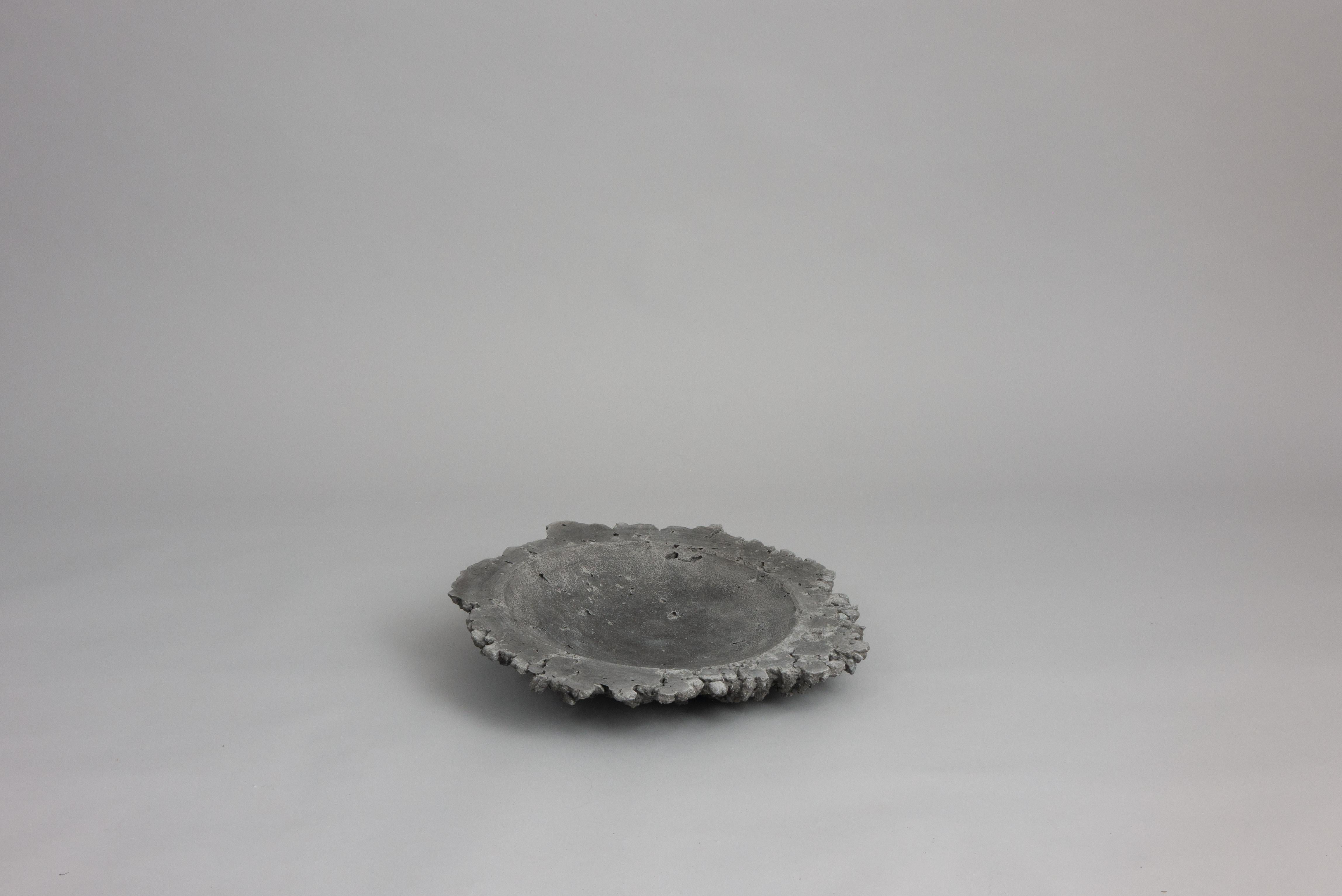 Small Artificial Formations Concrete Plate by Davide Ronco
Dimensions: D 45 x H 10 cm. 
Materials: Concrete.

Available in white and black. Please contact us.

Concrete, the most widely used material in the world after water, is an evident