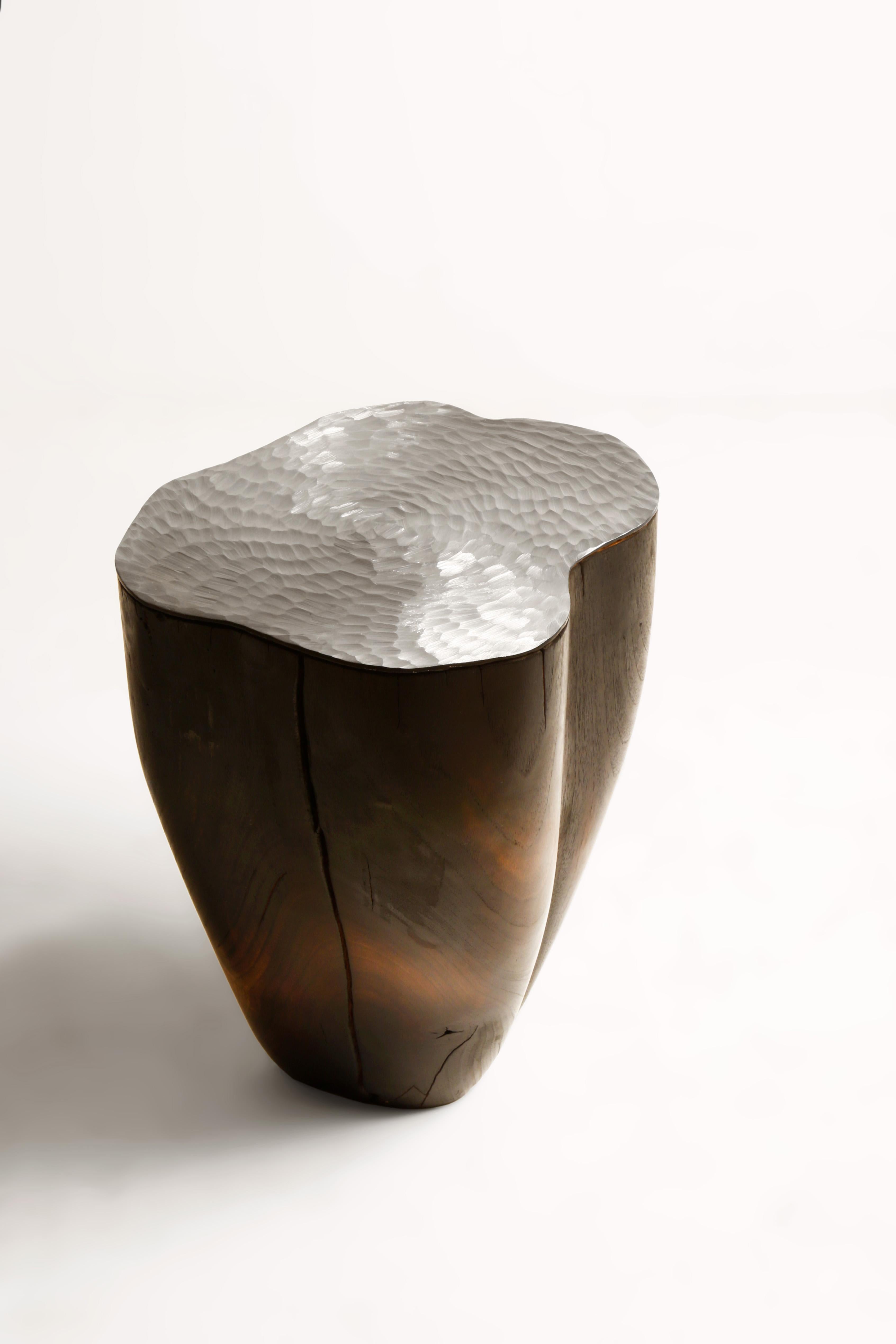 Duramen Stainless Steel Top and Solid Walnut Sculptural Object by Jules Lobgeois
Unique Piece
Dimensions: D 35 x H 42 cm.
Materials: Solid walnut, stainless steel.

The heartwood is the inner part of the wood and corresponds to the oldest growth