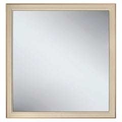 Miroir mural Astrelli en cuir et laiton brossé, par Madheke