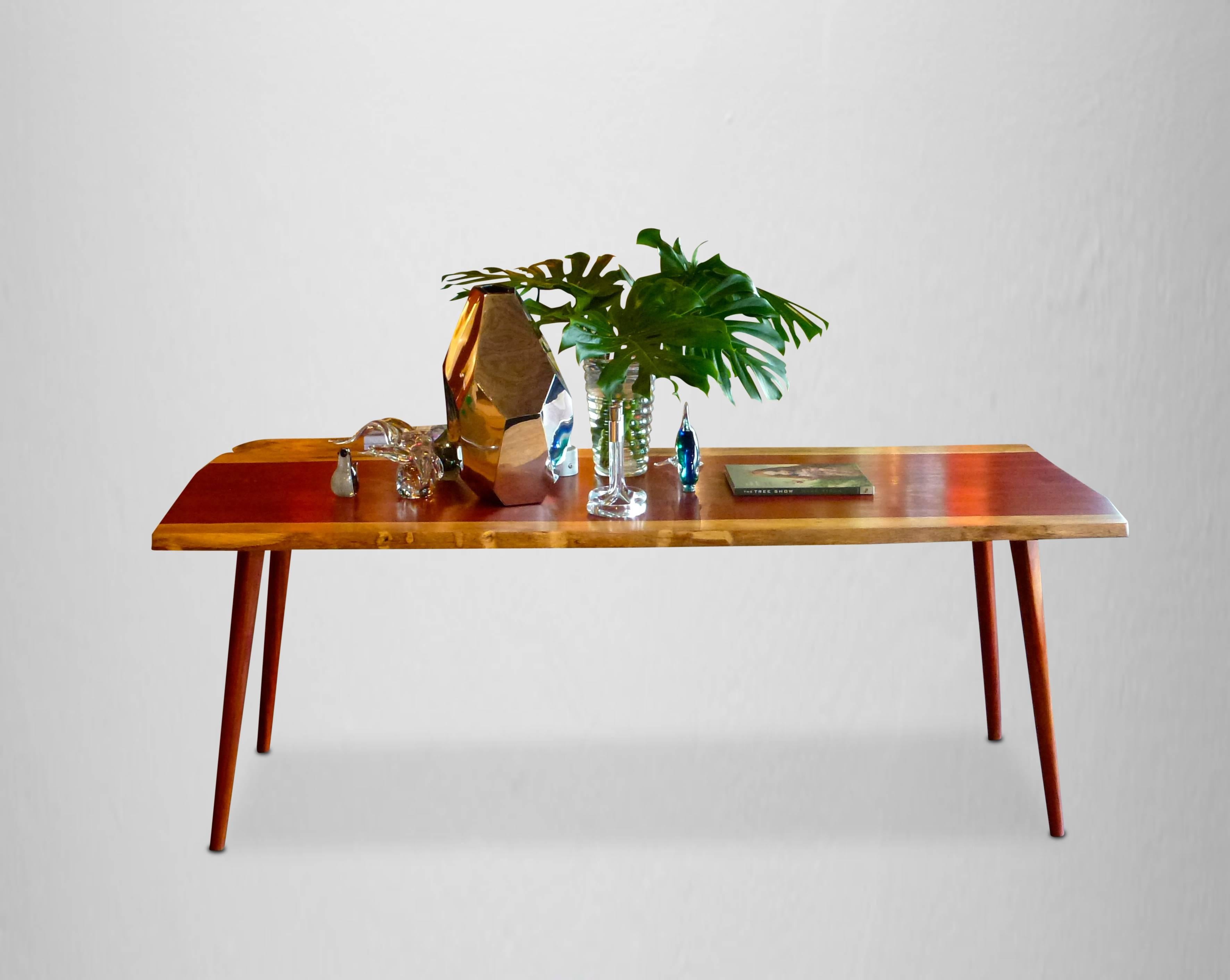 Unique signed table by Jörg Pietschmann
Dinner table, padouk, T1211
Measures: H 75 x W 210 x D 84 cm,
Rare big padouk plank, intense red colour with beautiful grain, which darkens to burgundy red.
Two mirrored planks give the 3.5 cm thick table top.