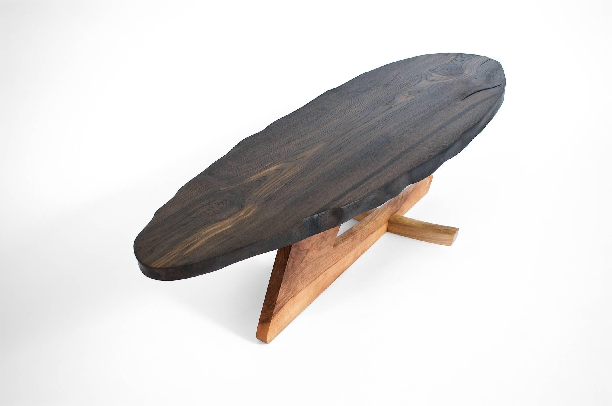 Unique signed table by Jörg Pietschmann
Table · Bog Oak, Europ. Walnut · T1385
Measures: H 38 x W 141 x D 43 cm tabletop 3.5 cm
tabletop made of black old bog oak, on specially designed feet made from walnut.
Polished oil finish.


In