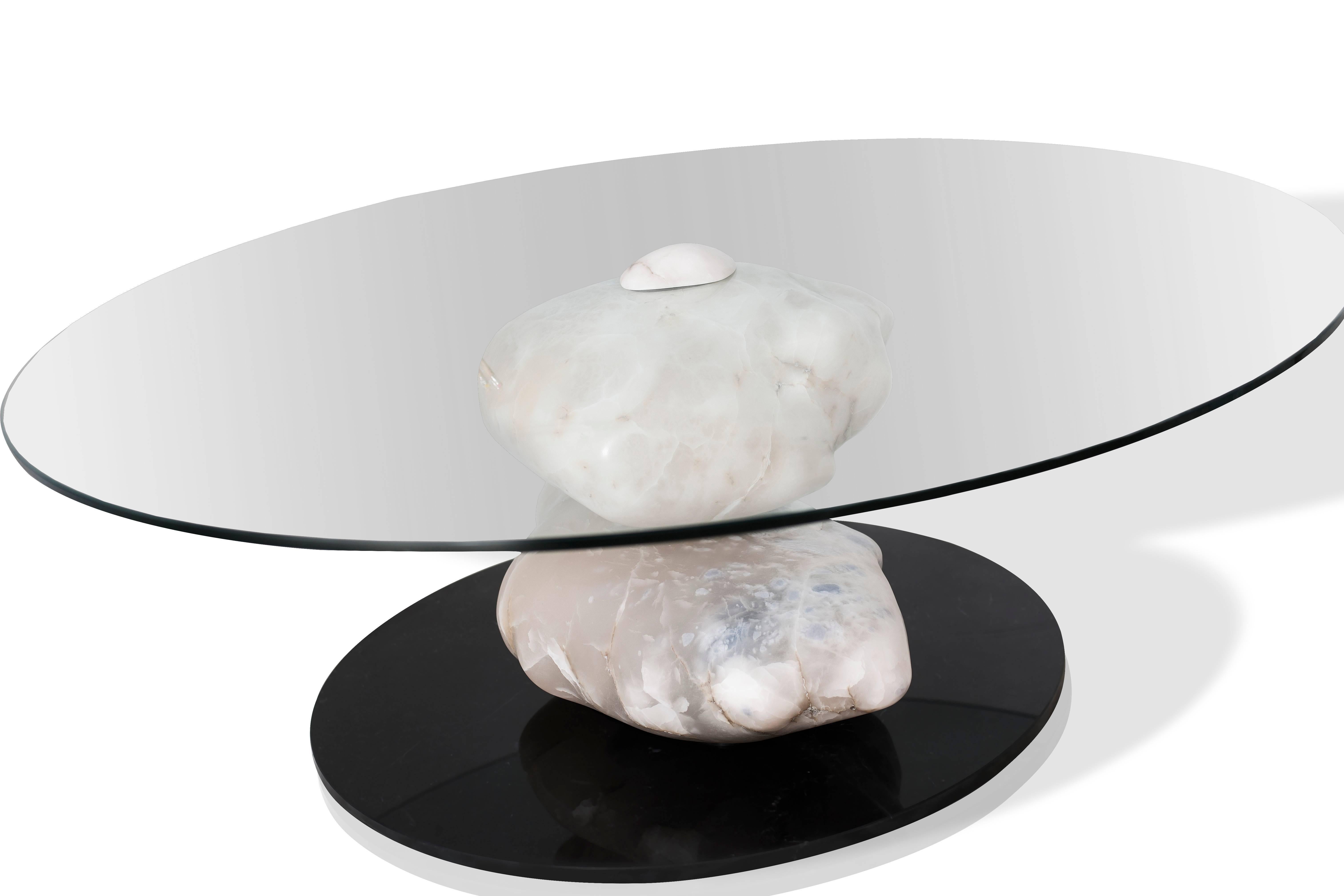 Unique contemporary terra center table by Amarist
Materials: Marquina marble, alabaster stone, tempered glass
Finishes
Natural or polished alabaster stone
Glass top diameter
Each alabaster stone is unique

Dimensions:
Height: 47 cm/ 18,5