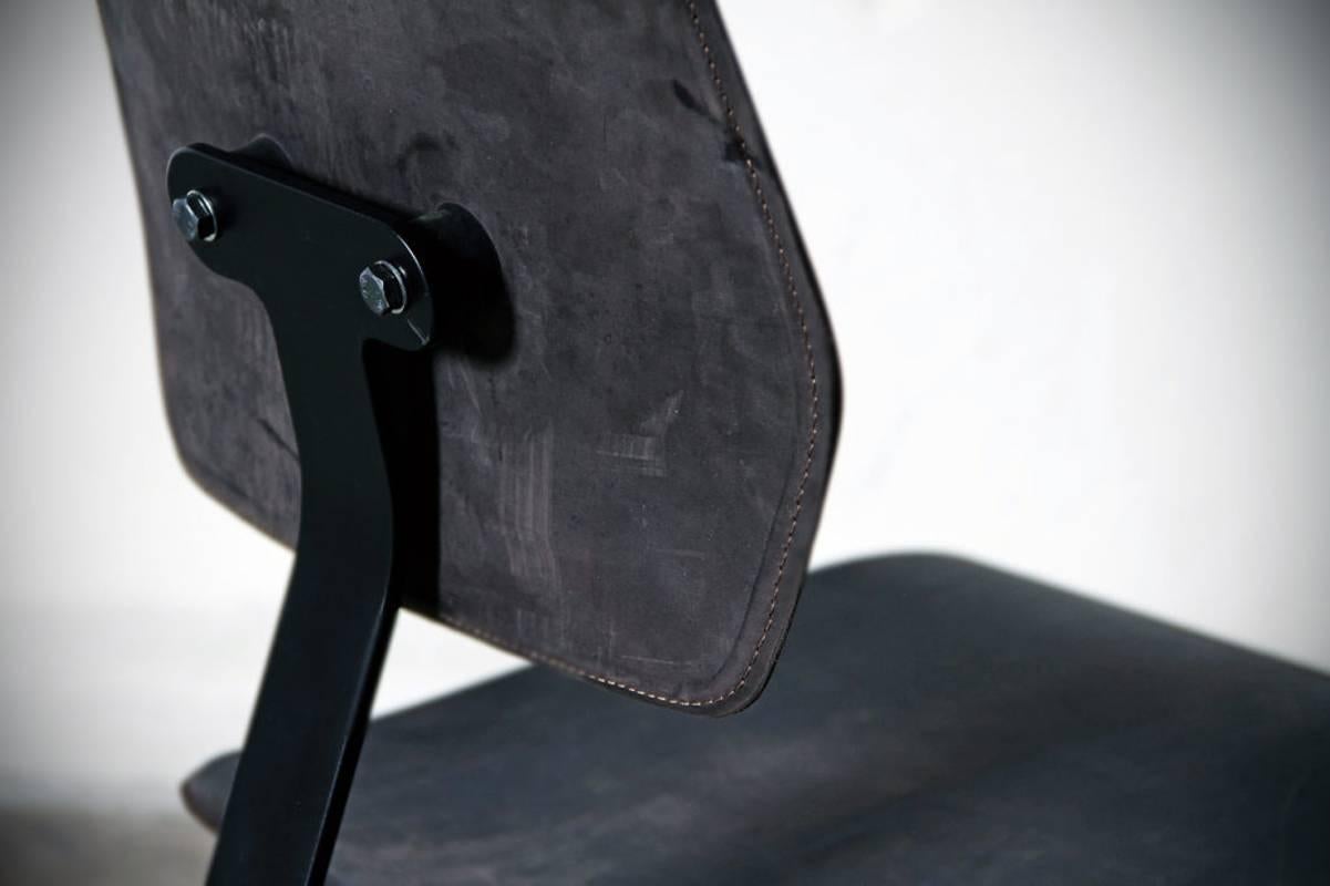 Kodak leather chair, Jesse Sanderson, WDSTCK Studio
Artist: Jesse Sanderson
Material: Steel frame; Nubuck leather
Dimensions: 87 x 55 x 51 cm (Seat height: 47 cm)

Exploring antique markets, Jesse Sanderson got intrigued by a series of old factory