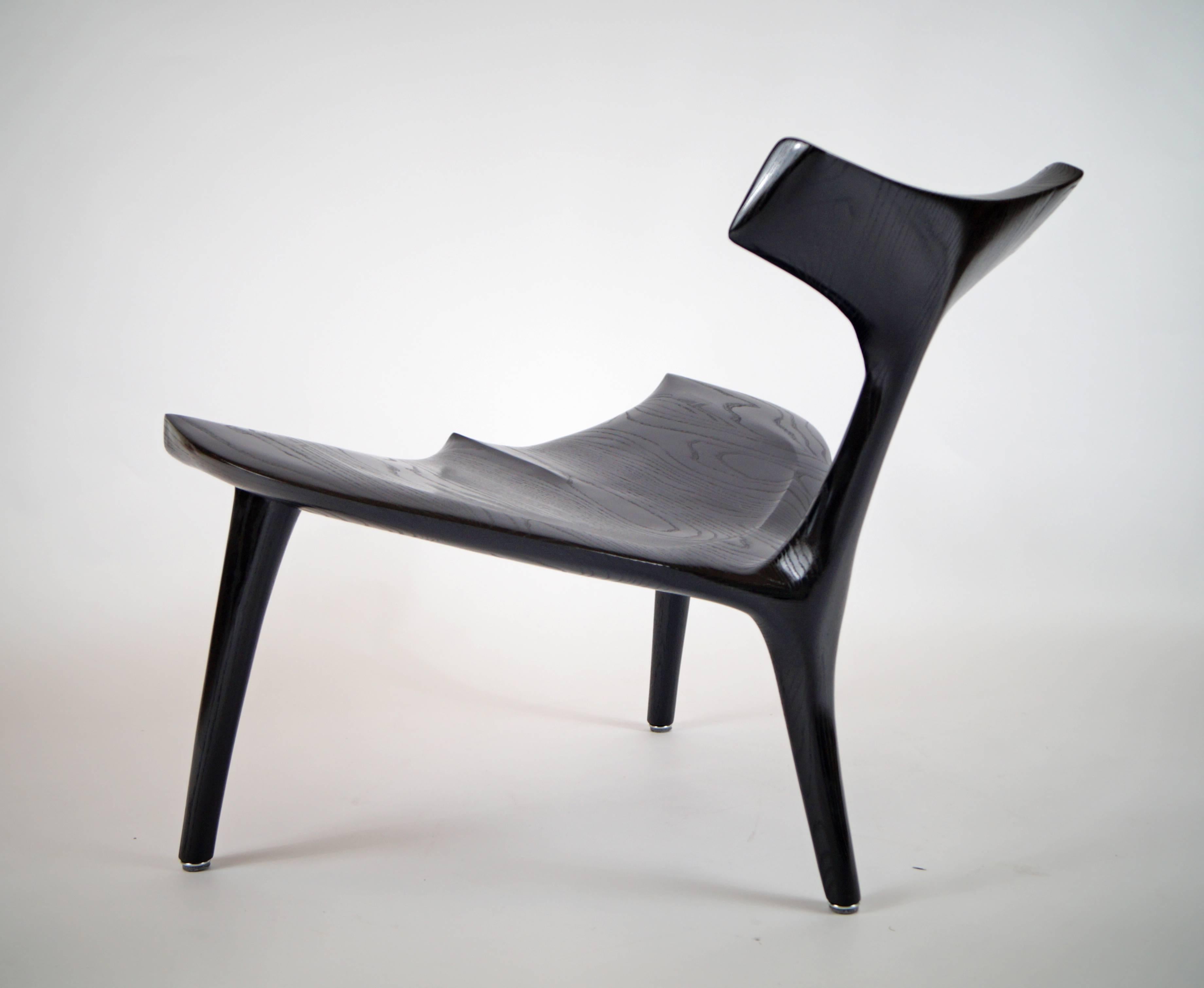Whale chair MS82, handcrafted and designed by Morten Stenbaek
Artist: Morten Stenbaek
Signed
Material: Ash finish: Indian ink og lak
Dimensions: 67 x 76 x 67 (Seat height: 39 cm)

When Morten Stenbæk enters his workshop, his thoughts and all