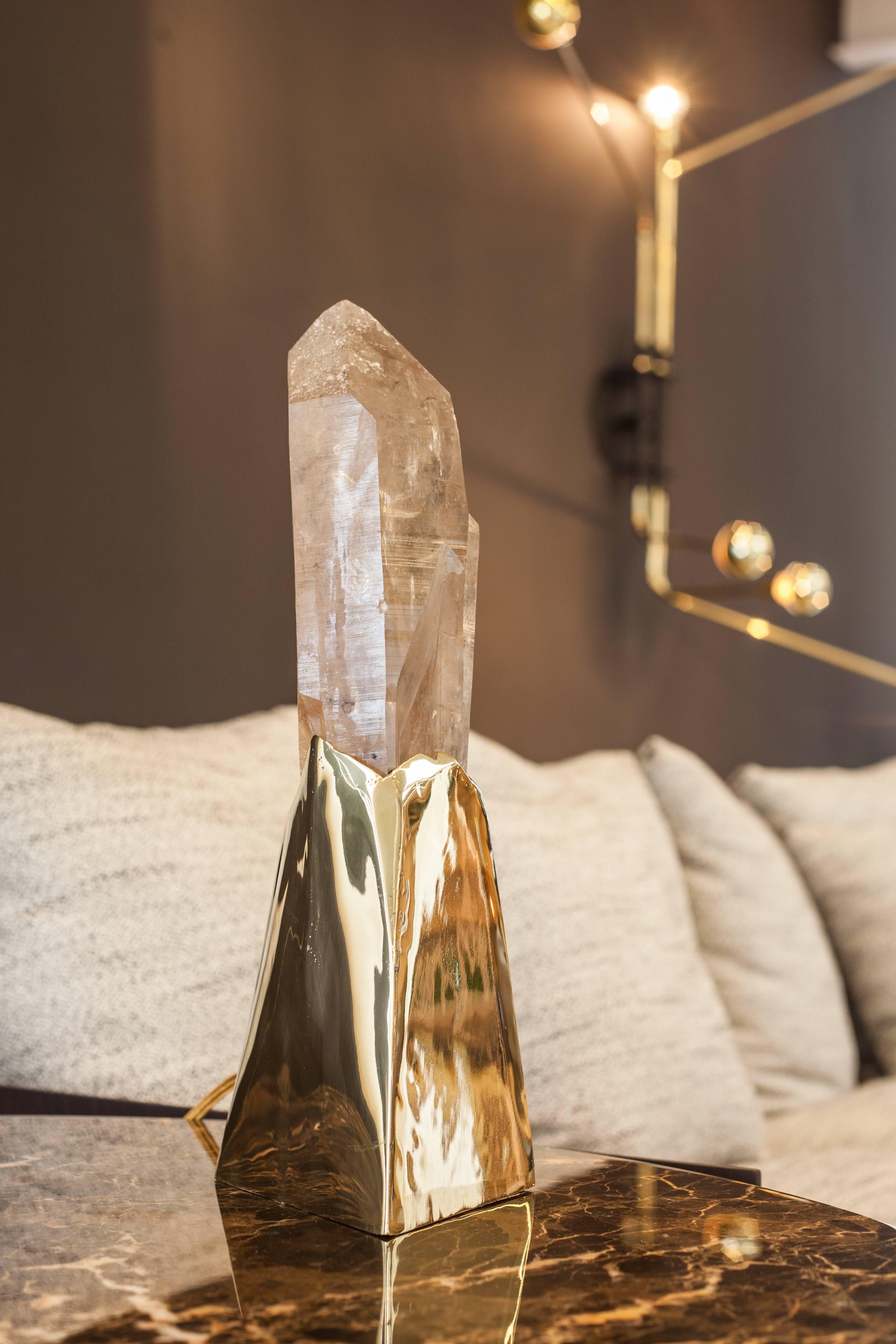 “Bi”
Unique natural dark amber Quartz point with some rutilio inclusion on the top of the point. A small point crystal popped out growing by the right. Giving the thought of a freeze grooving moment.
Base in steel with bronze bath. 
• 5.3 kg
•