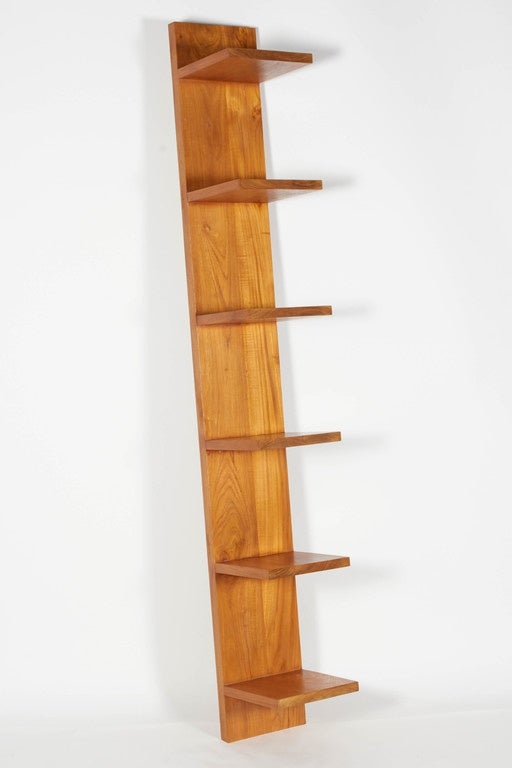 Solid teak leaning book shelf custom-made in Bali. Collaborative design by Donna Karan and Bonetti/Kozerski Studio for Urban Zen. Limited quantity currently in stock. No international shipping.