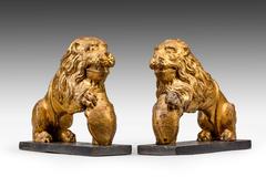 Pair of Tudor Carved Oak and Oil Gilt Lions