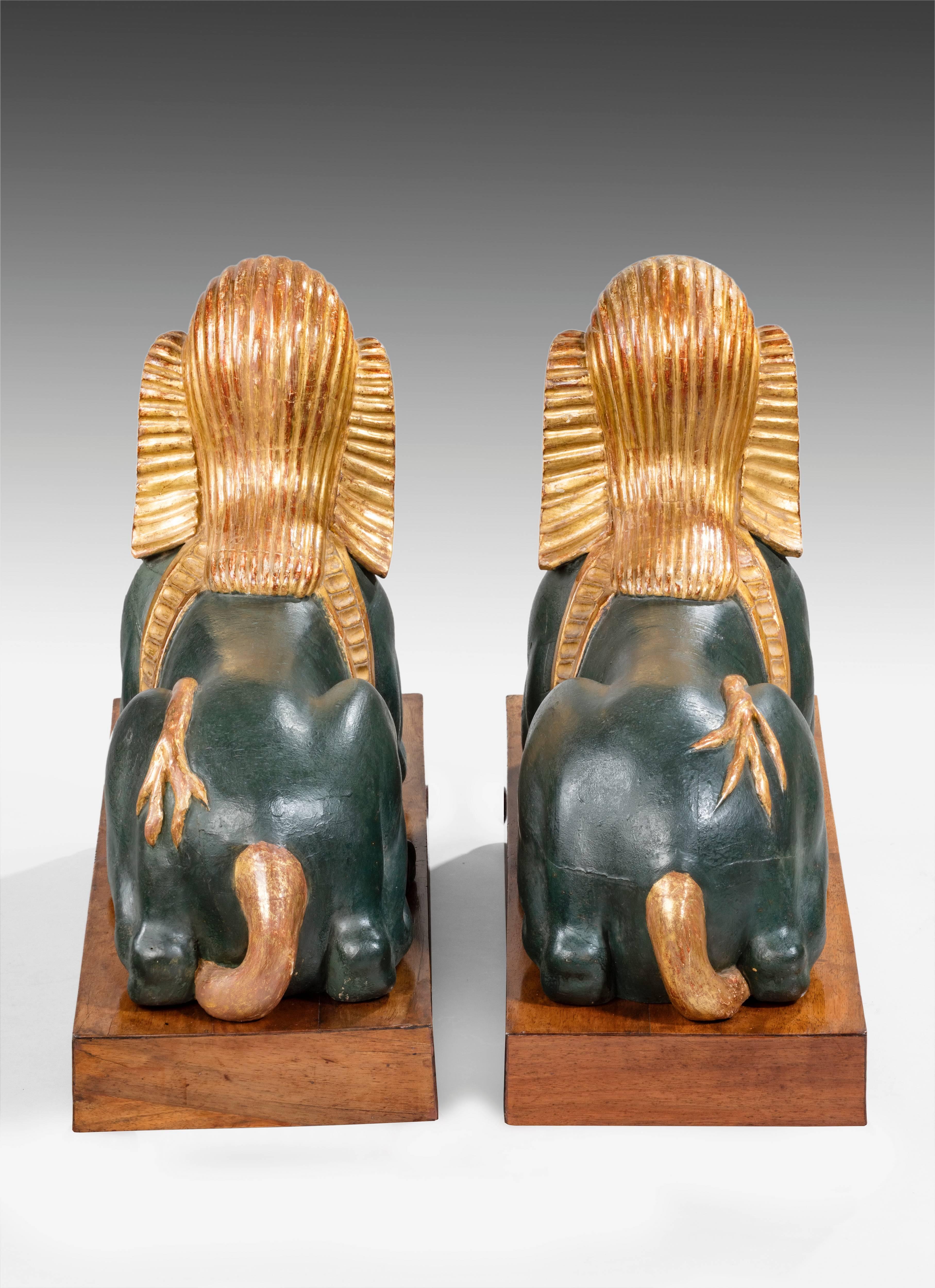 Spanish Pair of Carved Wood, Gesso, Polychrome and Gilt Decorated Egyptomania Sphinxes