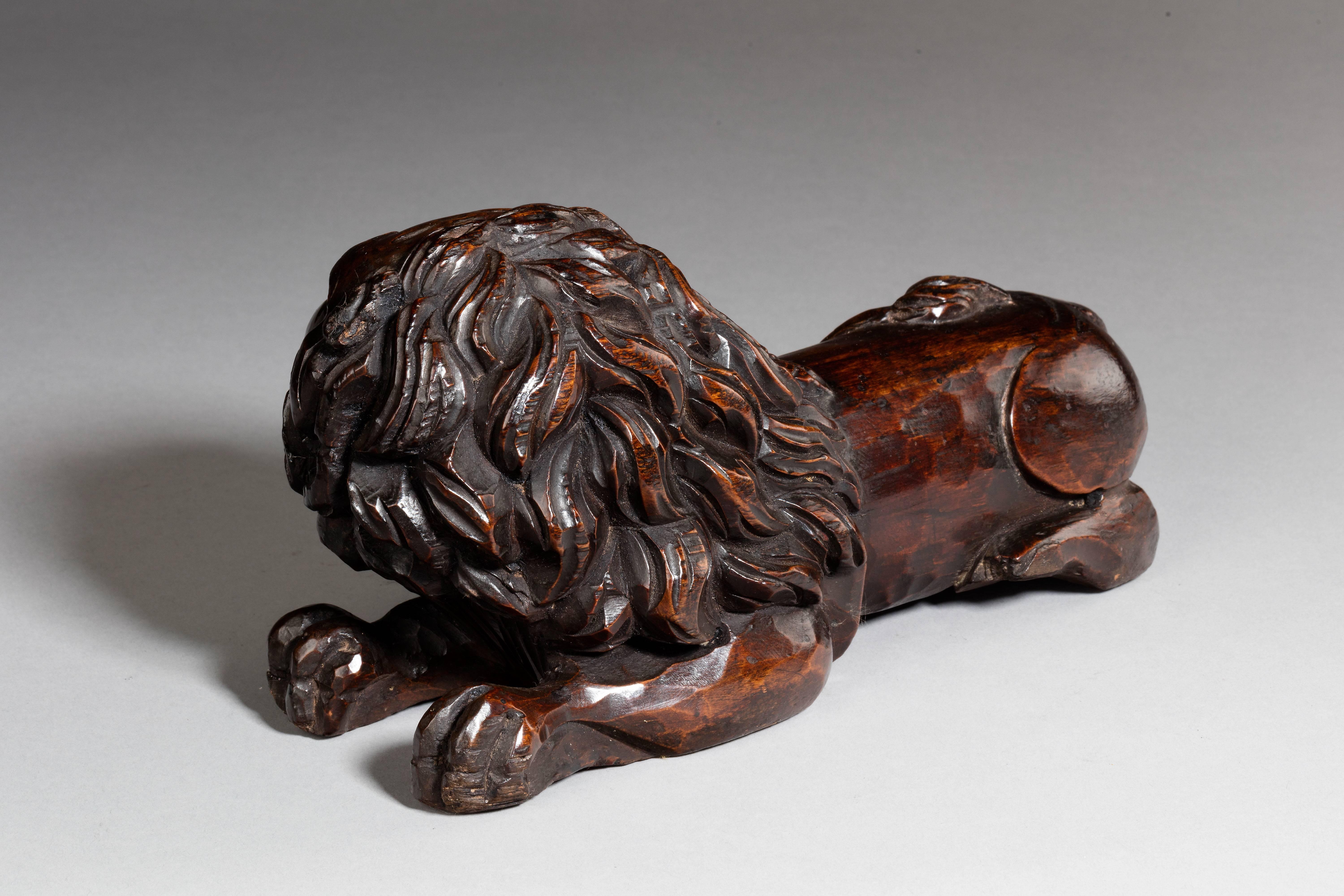 Carved Fruitwood Carving of a Recumbent Lion