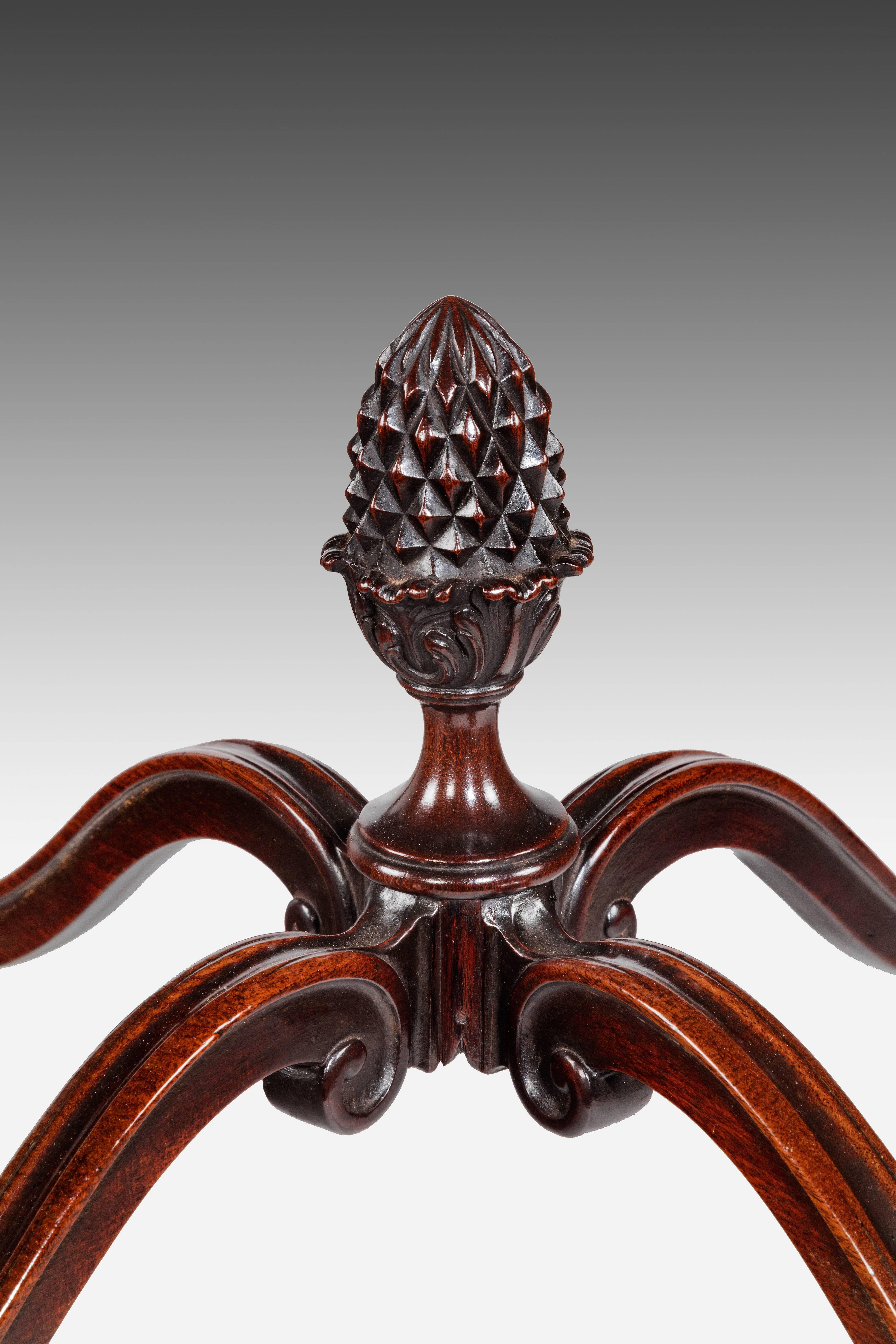 Depth (closed): 71cm (28 inches); Depth (open): 98cm (38.5 inches).

A George III mahogany Pembroke table with serpentine or butterfly-shaped leaves above a single end drawer with two original axe-head drop handles. Standing on carved cabriole