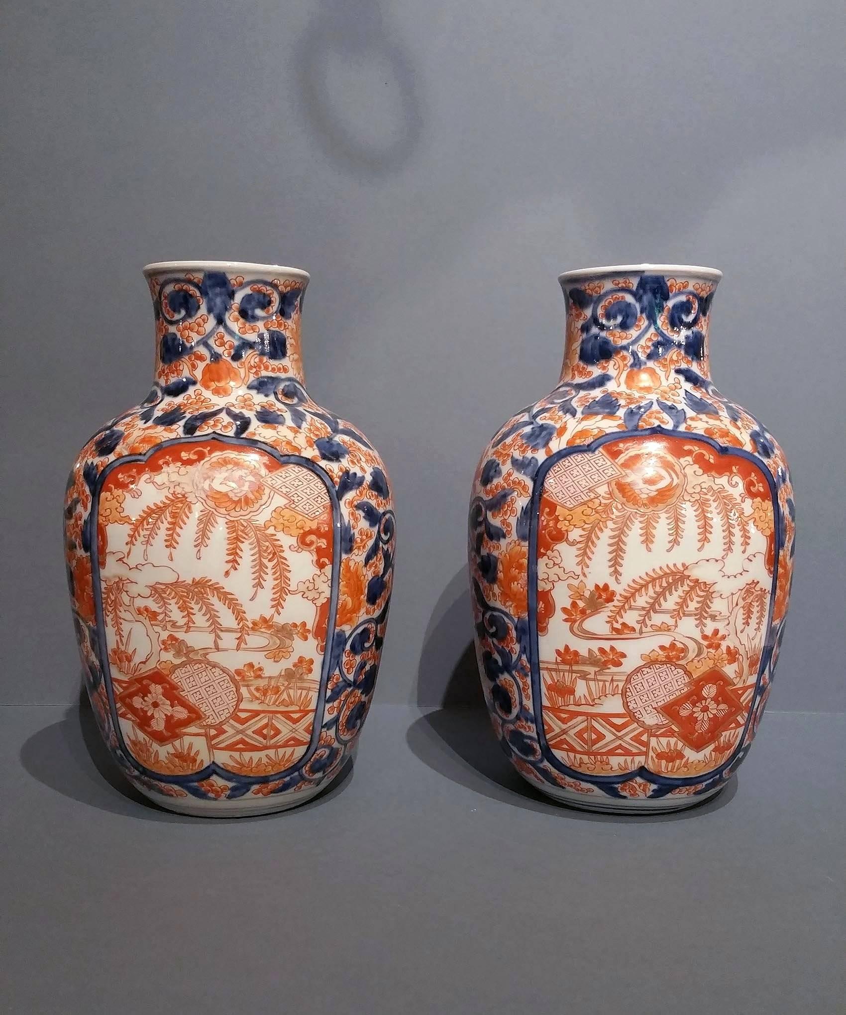 Japanese Pair of Long Neck Imari Vases