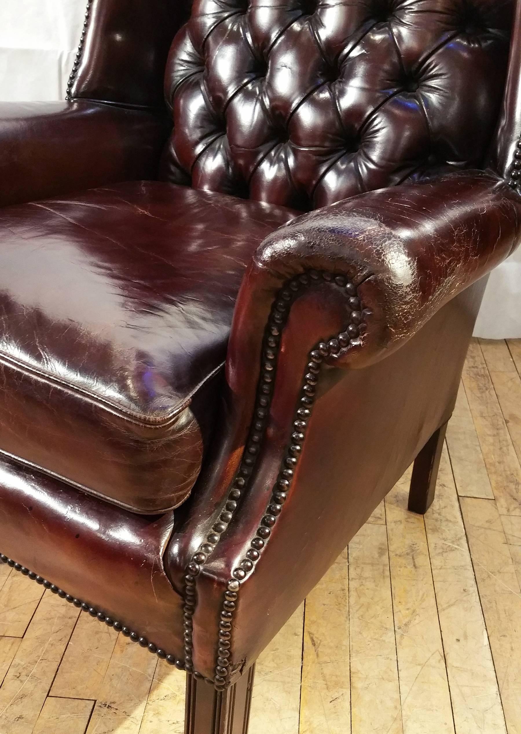 Pair of Deep Buttoned Leather Upholstered Edwardian Wing Chairs In Excellent Condition In London, GB
