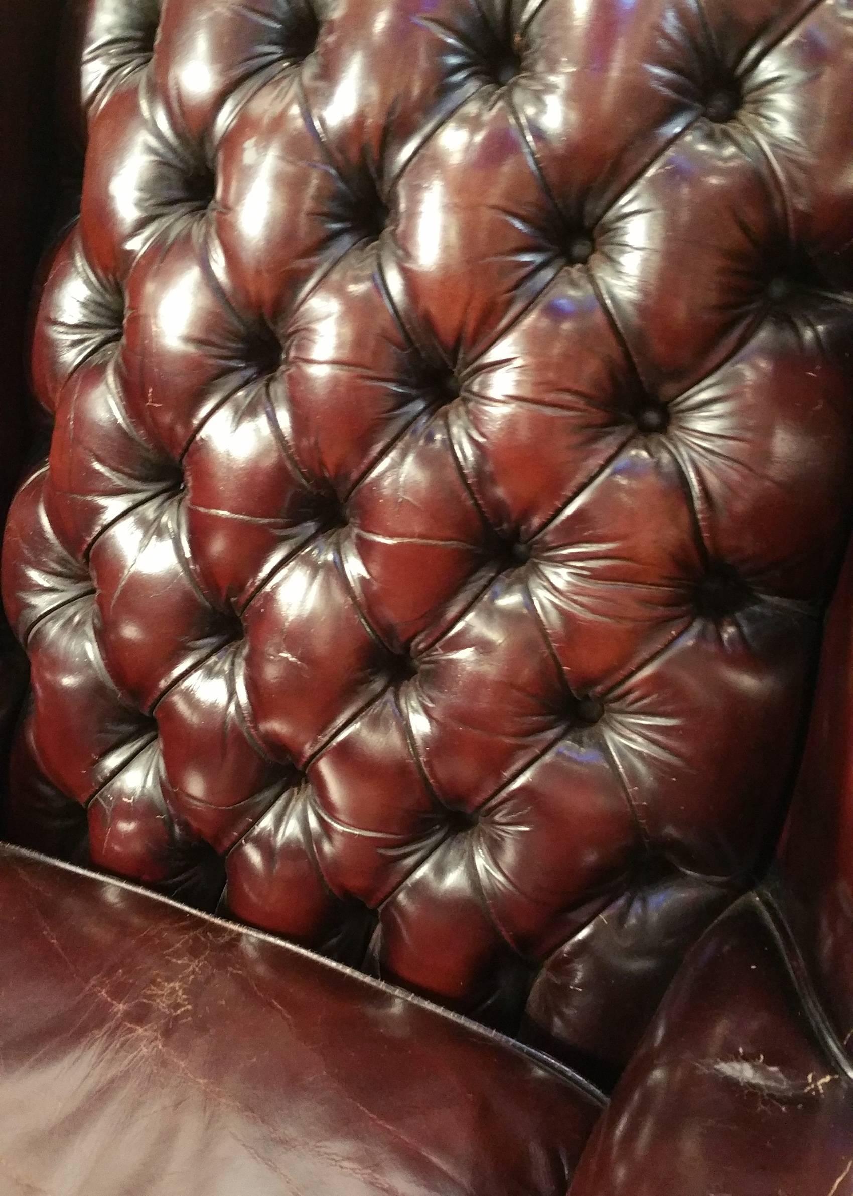 20th Century Pair of Deep Buttoned Leather Upholstered Edwardian Wing Chairs