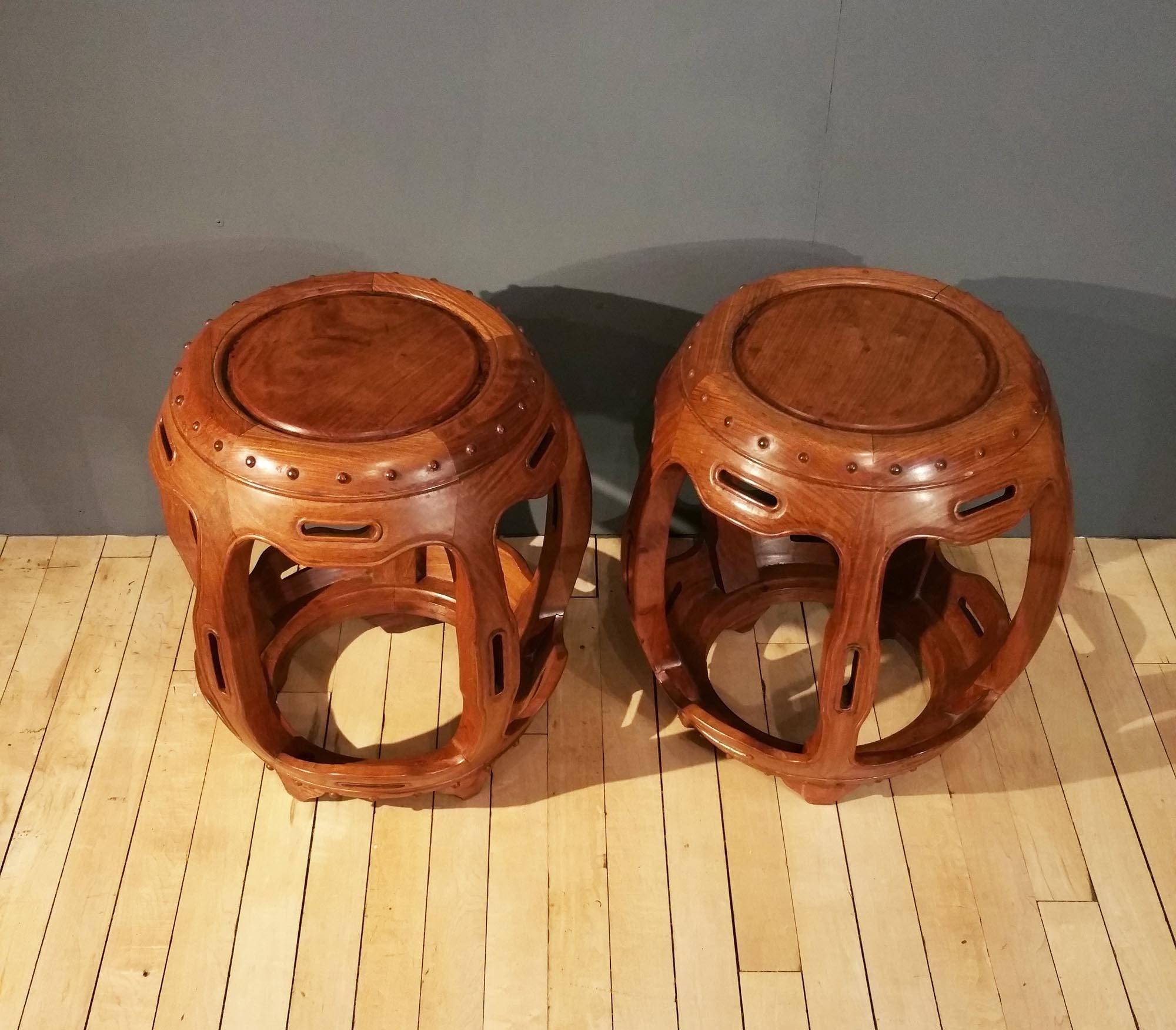 This very attractive pair of light colored Chinese hardwood barrel seats feature a decorative cut-out and shaped design. Each seat measures 16 in – 40.5 cm in diameter and 17 ¾ in – 45 cm in height.