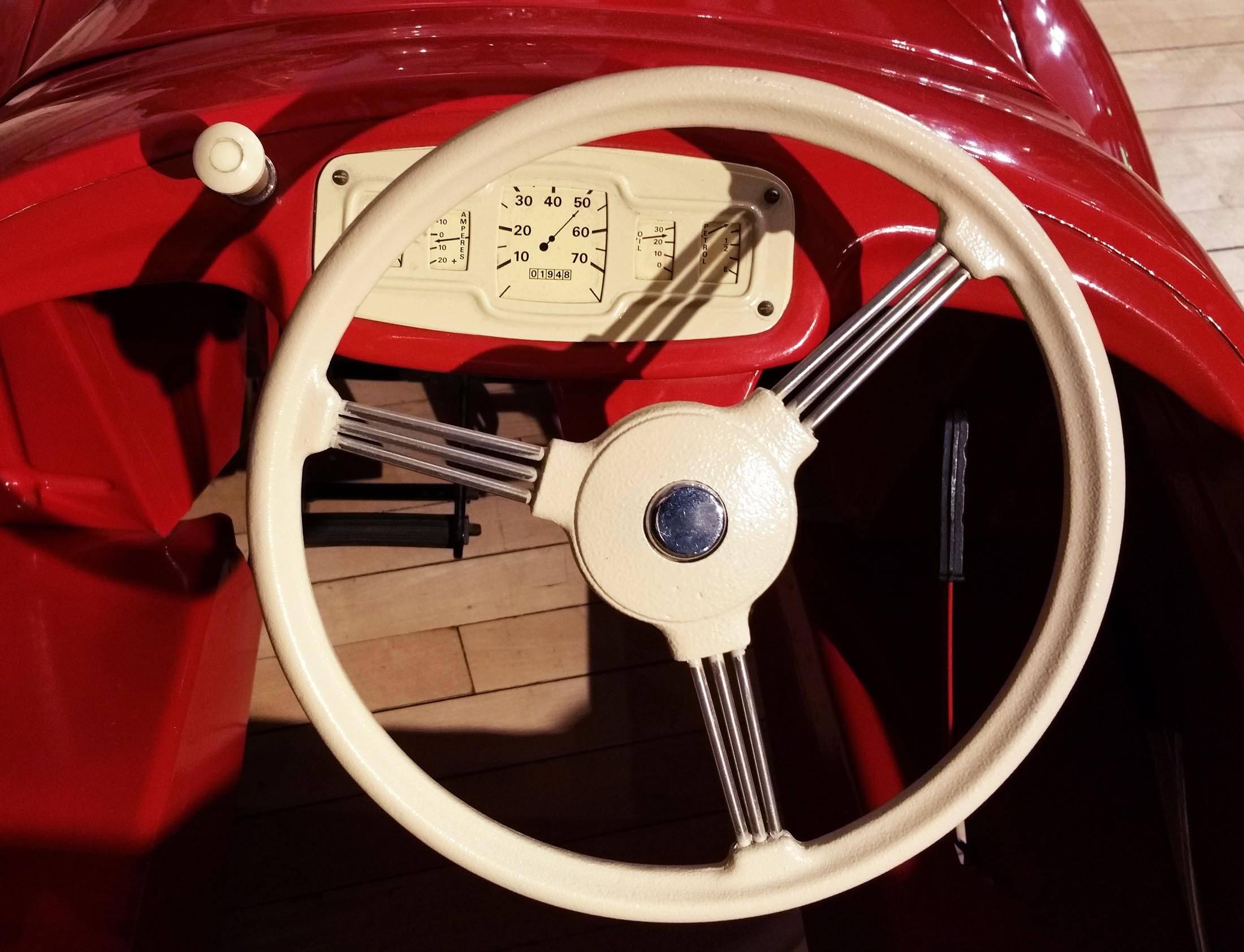 This superb and absolutely gorgeous child’s pedal car in the form of an Austin J40 is a numbered limited edition and restored in full working order. This child’s pedal car is a model of a Classic car, with working horn and lights and numerically