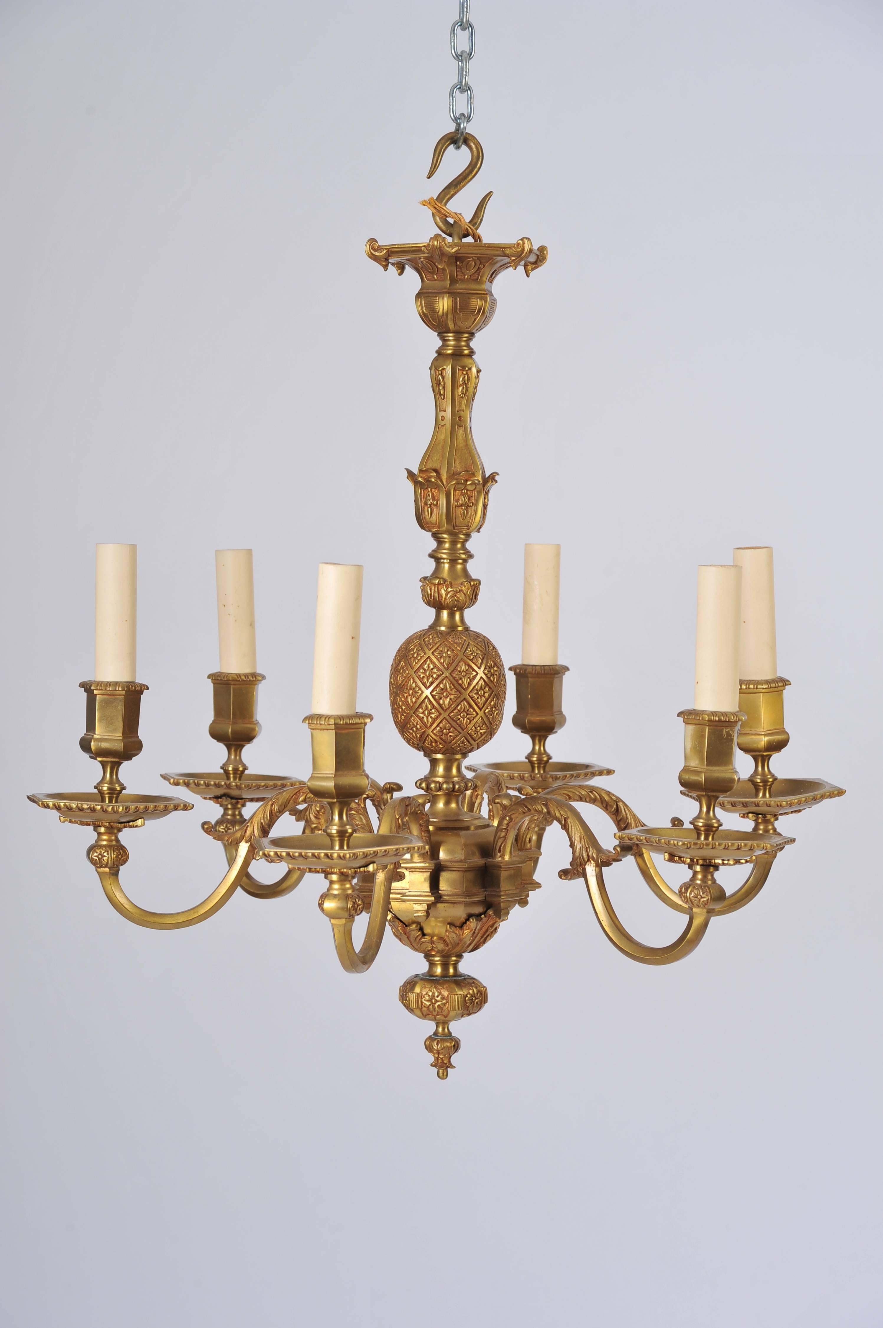This wonderful pair of ormolu chandeliers is Flemish in design, and feature a six arm configuration. Each light measures 25 in – 63.5 cm in diameter and 25 in – 63.5 cm in height. The central column has a Fabergé styled ‘egg’ decoration and