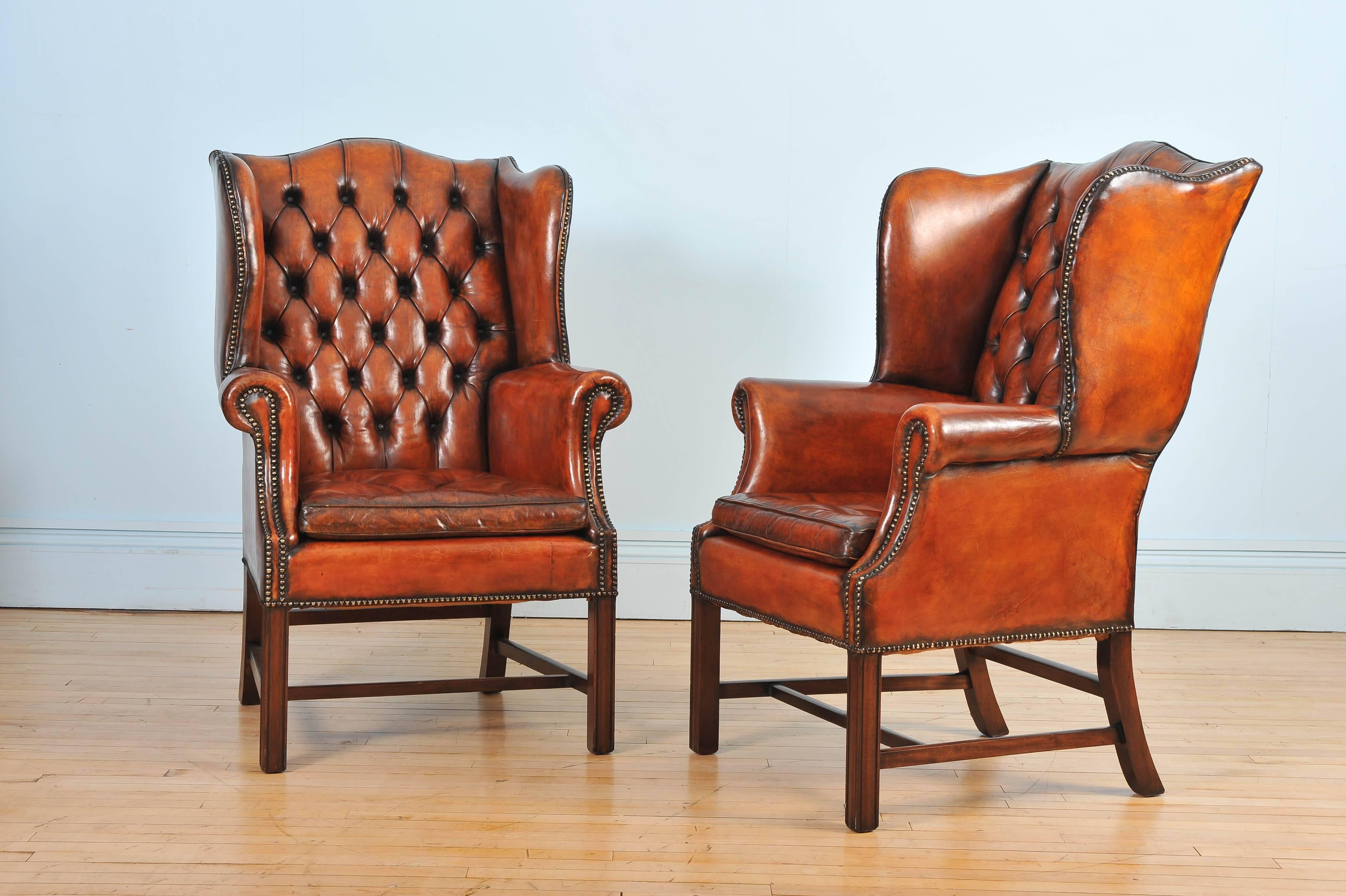 English Pair of Mid-20th Century Button Back Leather Wing Chairs