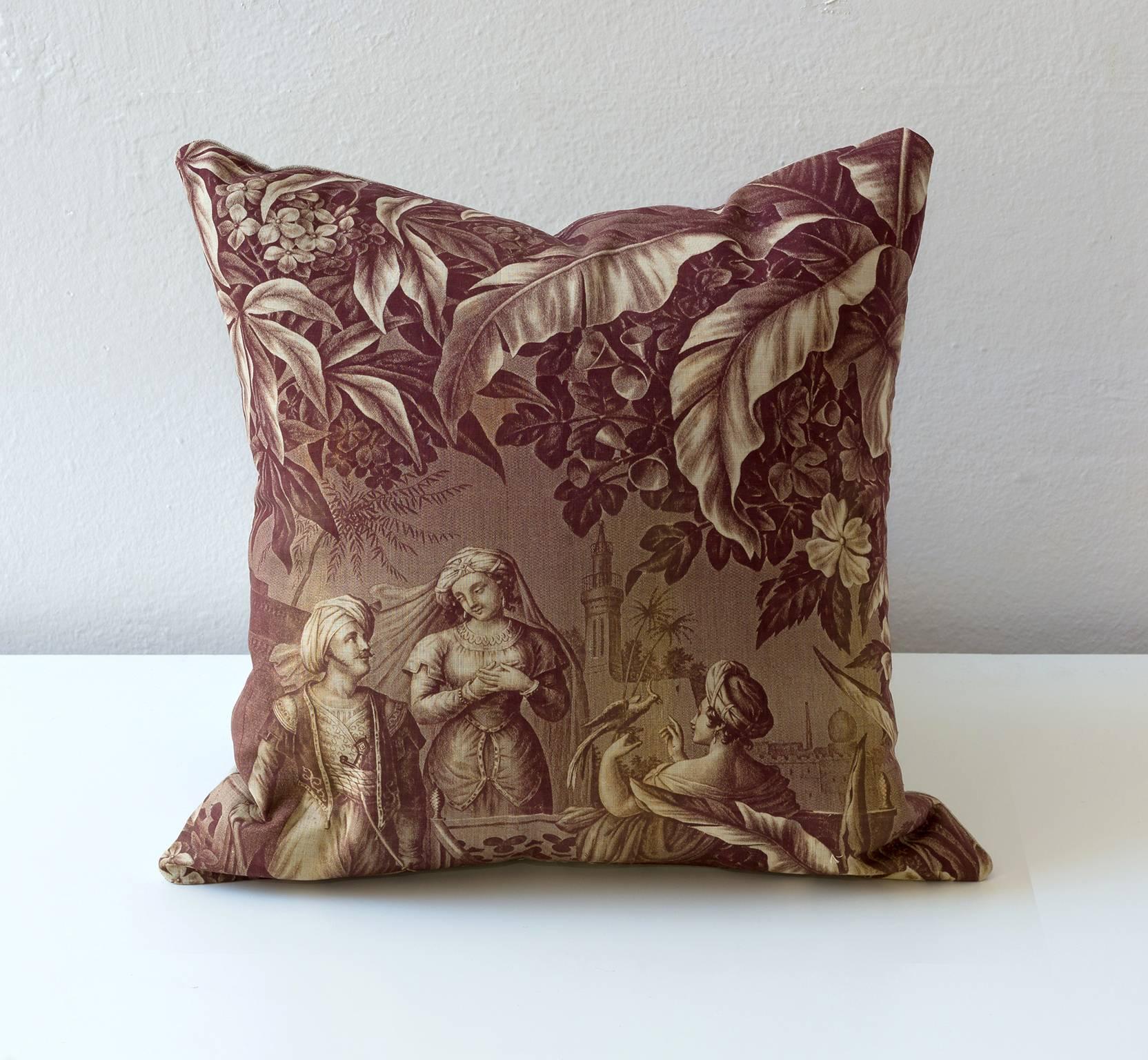 A scene of a reclining turbaned figure with friends under lush foliage. A classic puce Toile de Nantes color. A set sold individually 

Linen on reverse--see image
75/25 goose feather and down inserts.
Handsewn closure.
Check our 1stdibs