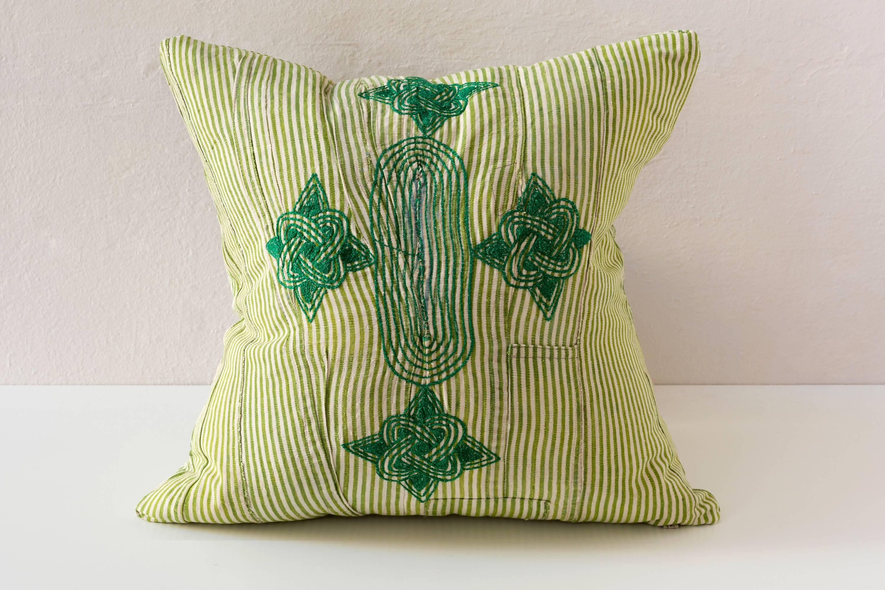 Central green embroidery on narrow loomed cotton stripe in chartreuse and pale green. Embroidery on front same cotton on front and back. 

feather and down inserts.
Concealed zipper.
Check our 1stdibs storefront for pillows in coordinating fabrics.
