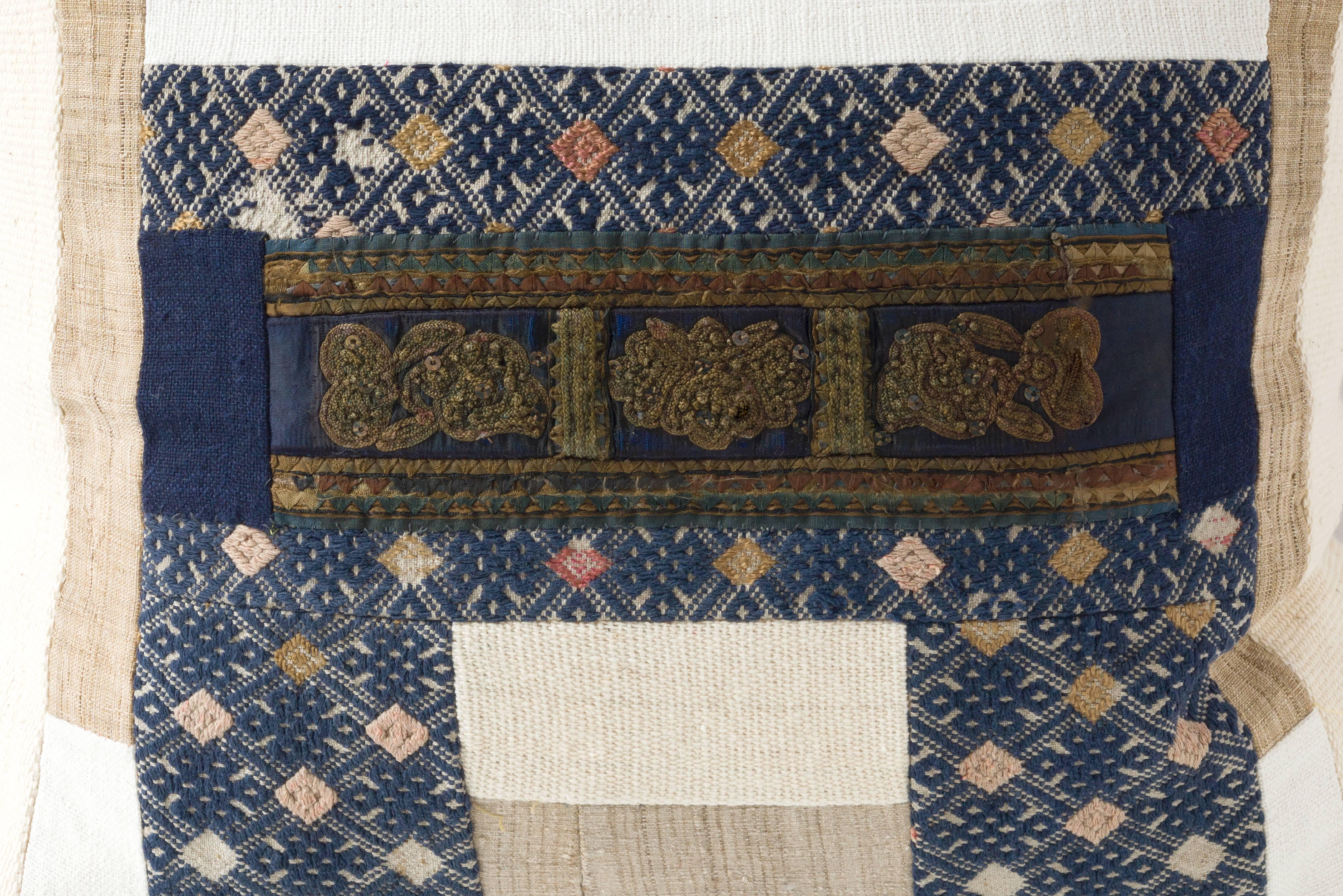 Vintage piecework pillow made from Dong embroidery and Zhuang dowry textiles Hmong hemp and Mali African textiles. 
- Linen on reverse--see image
- 75/25 goose feather and down inserts.
- Concealed zipper.

 