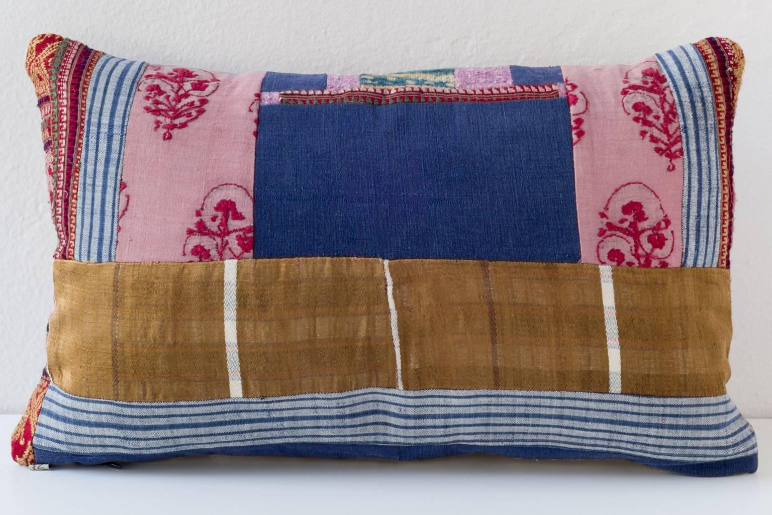 A central panel of indigo futon cover from Shandong or Hebei province with a Huang Ping County woven silk scarf. Accent of Ndop Cameroon indigo with Laos Tai Daeng textile and Indian dowry needlework. 

- Linen on reverse--see image
- 75/25 goose