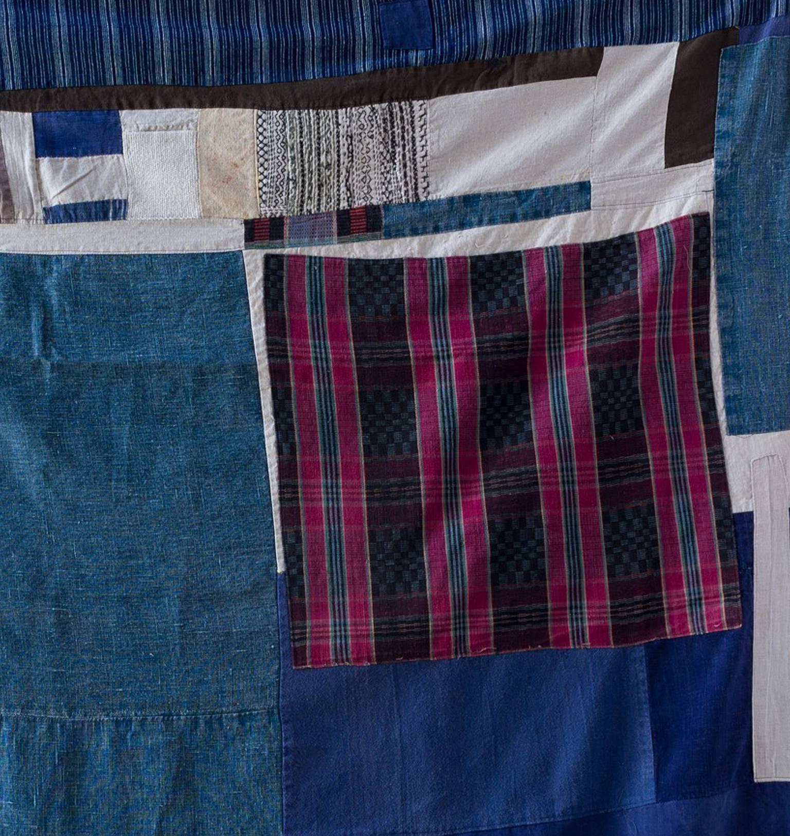 Lap blanket made from vintage fabrics. Piecework composition of Hebei cotton futon covers: Indigo and hand-loomed plaids, ethnic minority textiles, Guatemalan handwoven stripes and contemporary linens. Two layers lined with coordinating linen on