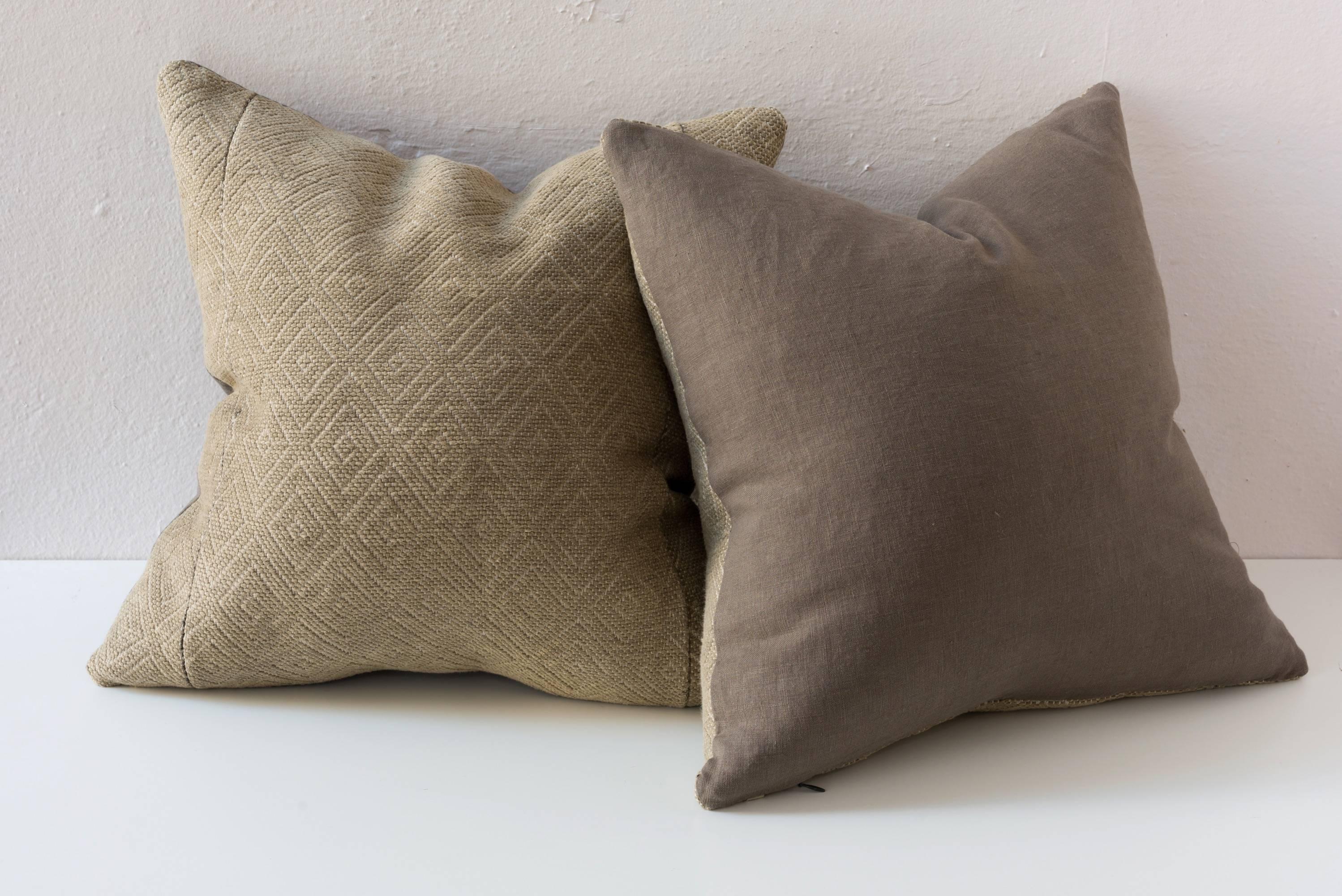 Vintage dowry textile cushion in a pale green grey handwoven in a diamond pattern. Four pillows available. 

Linen on reverse-see image
75/25 goose feather and down inserts.
Concealed zippers.
Check our 1stdibs storefront for pillows in coordinating