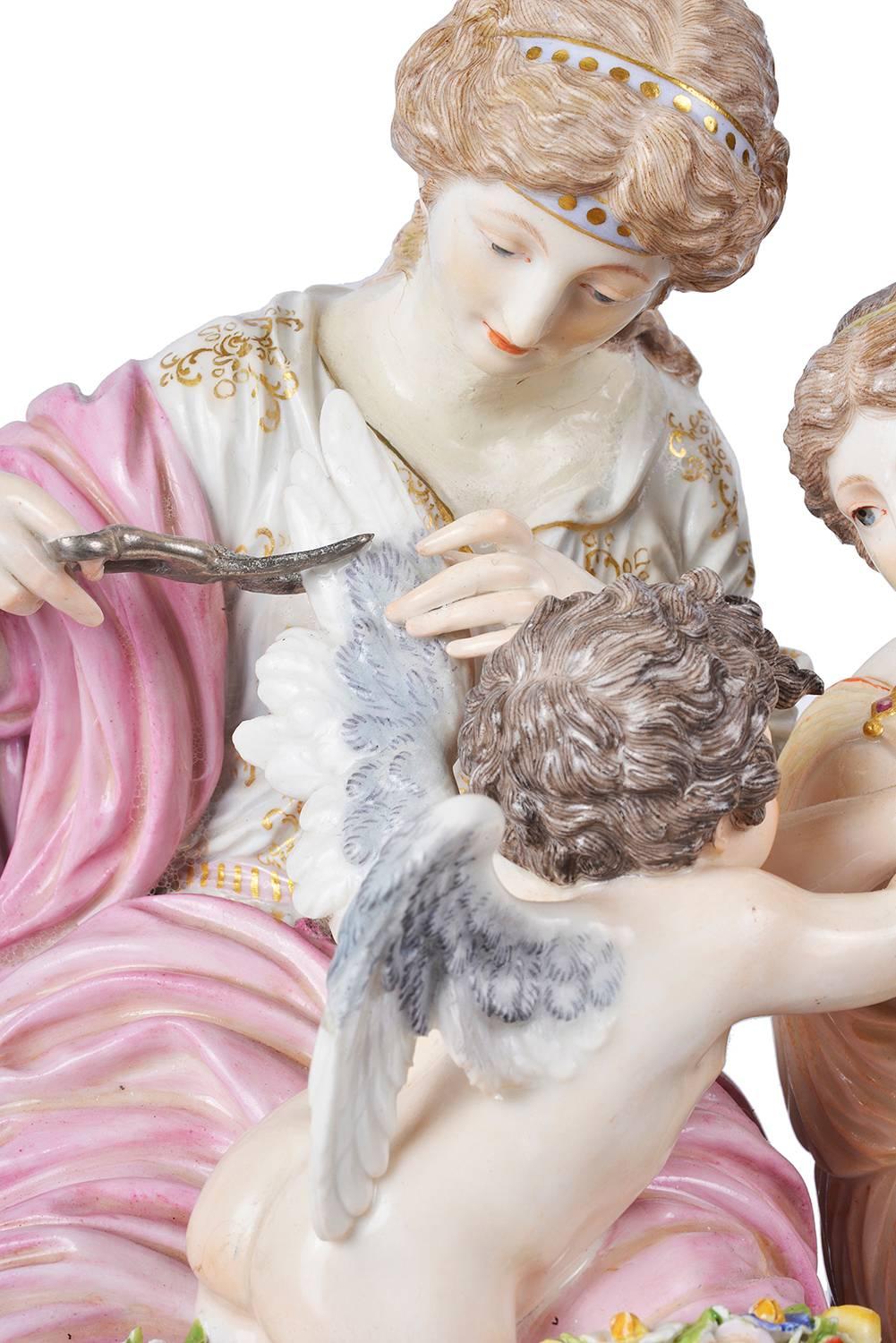 A very good quality 19th century Meissen porcelain group, depicting a cupid in trouble, crossed swords to the base.