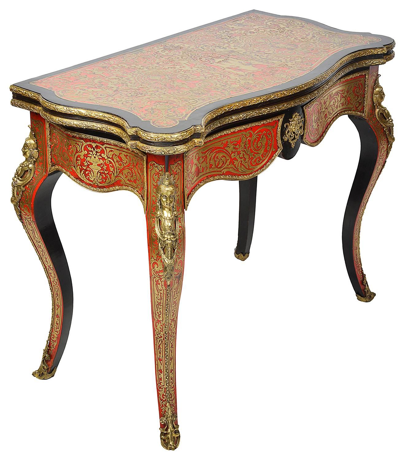 A good quality 19th century French Boulle inlaid card table, having gilded ormolu mounts, classical scrolling inlay with figures in the centre, opening to reveal a green baize card playing surface. Raised on elegant cabriole legs, terminating in
