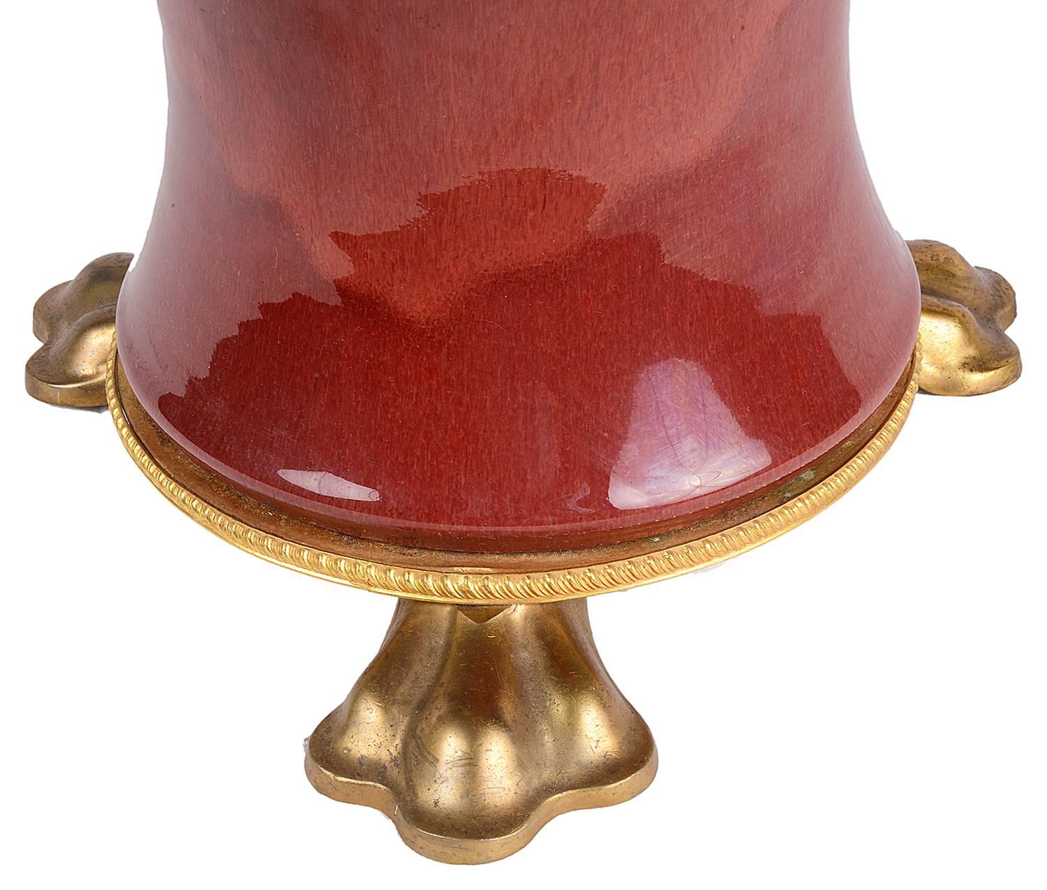 A good quality 19th century Chinese Sang du Bouf porcelain vase / lamp. Having gilded ormolu mounts.